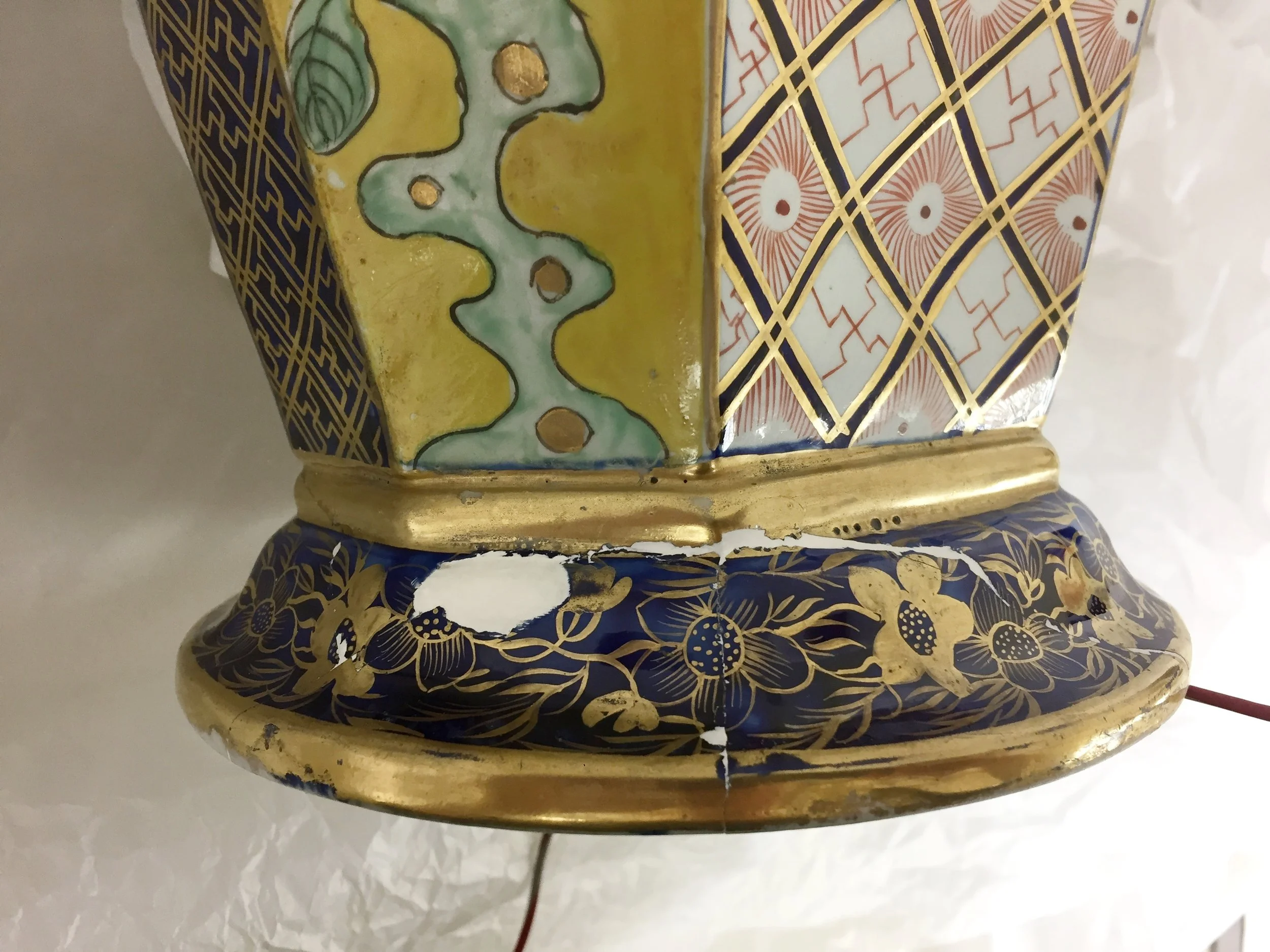  Filling in the areas of loss on the outside of the base.  