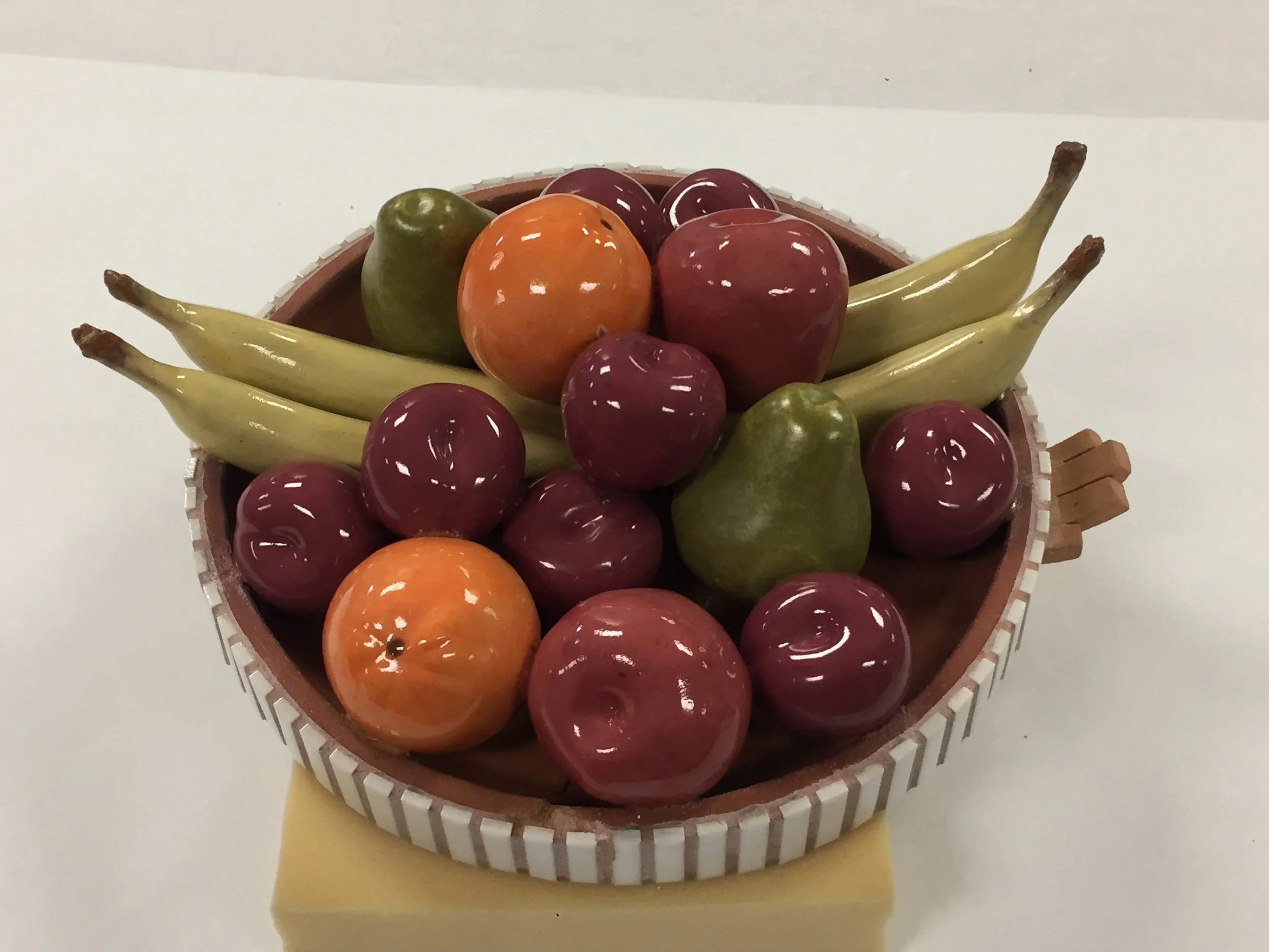  The bonded, filled and painted fruit plate. This was ready to be remounted on the object. 