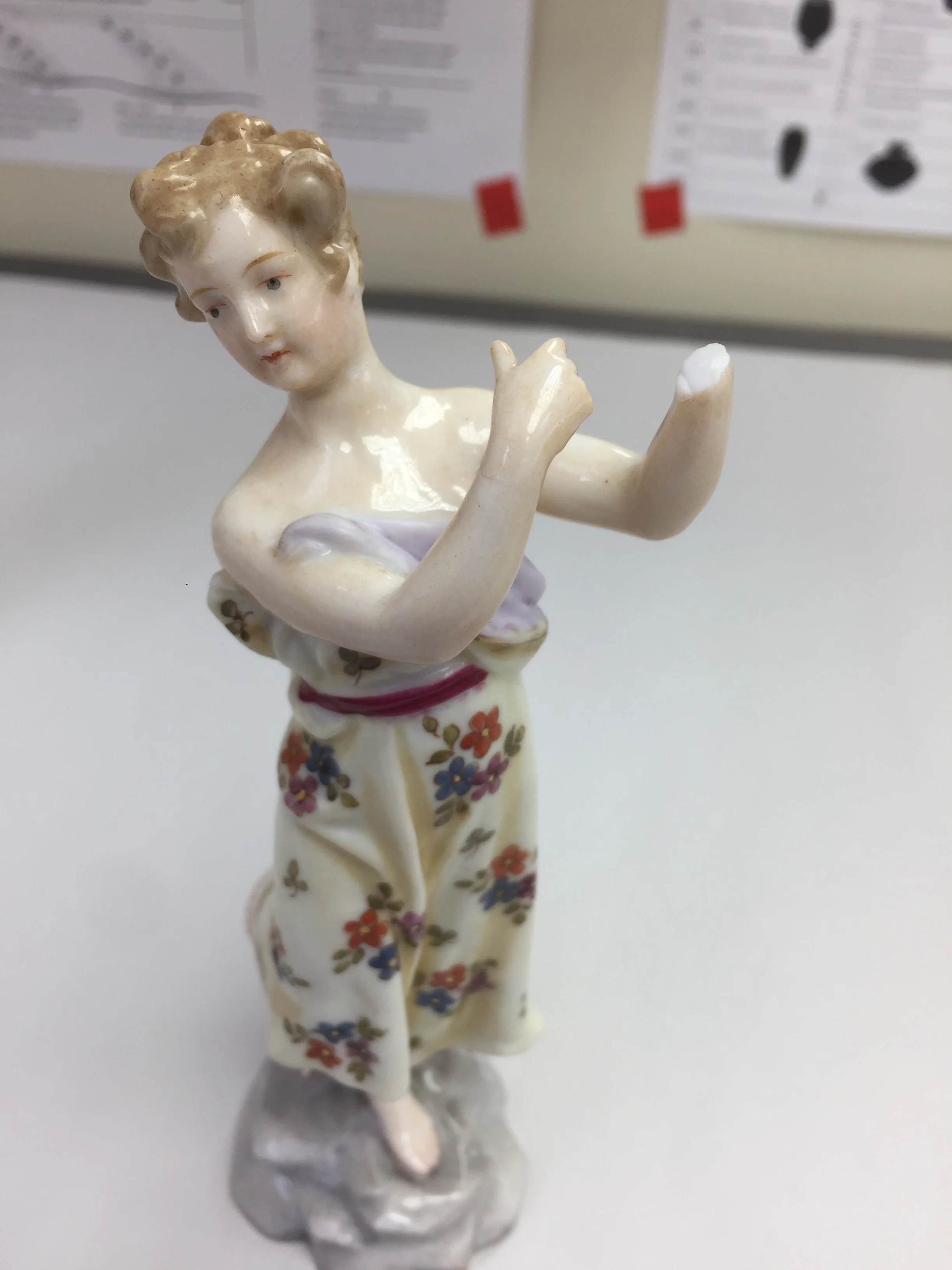  After cleaning, the arms and head were reattached to the body of the object.  