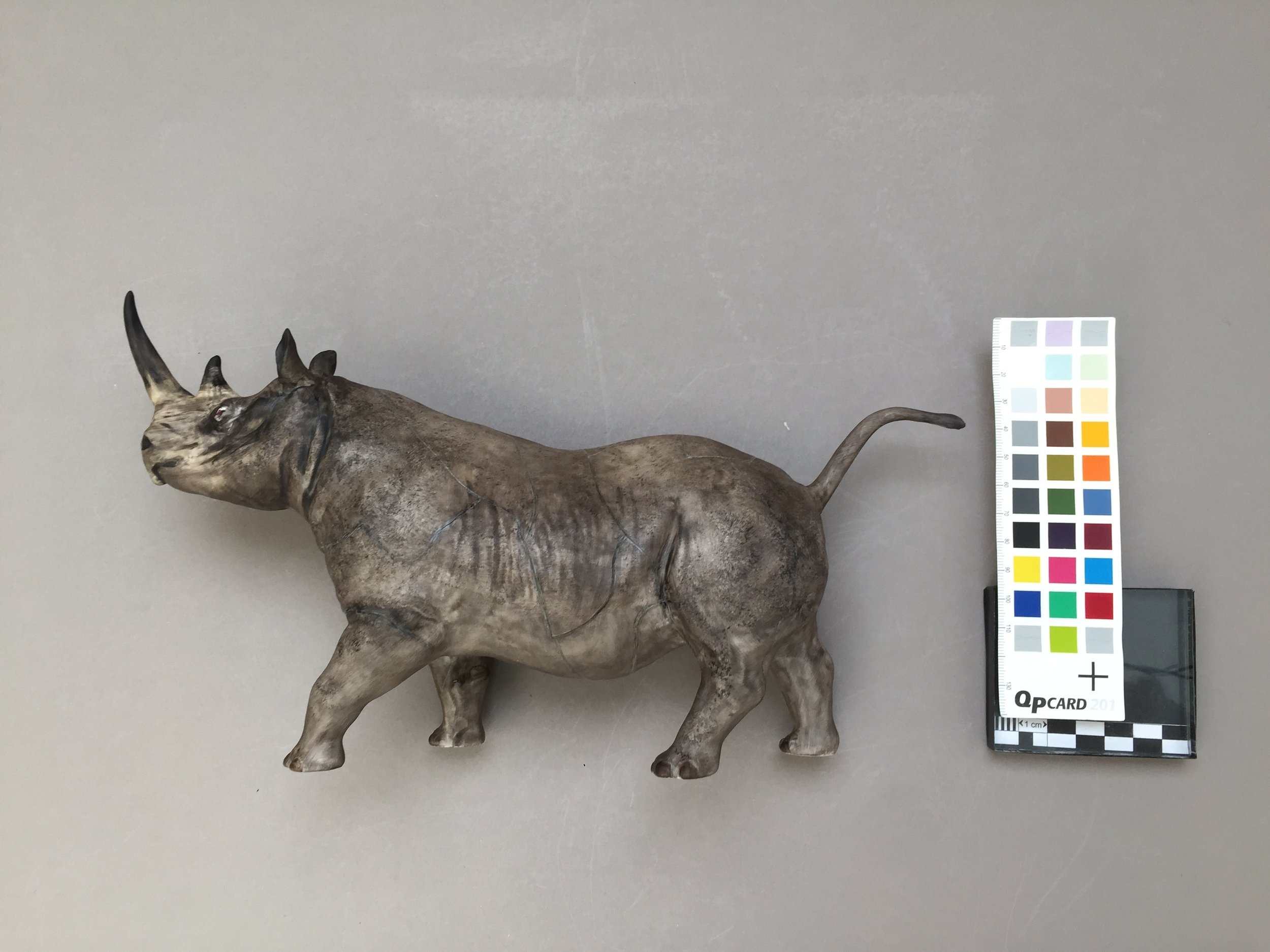  The fills were then painted to match the surrounding areas of the object. This completed treatment.  