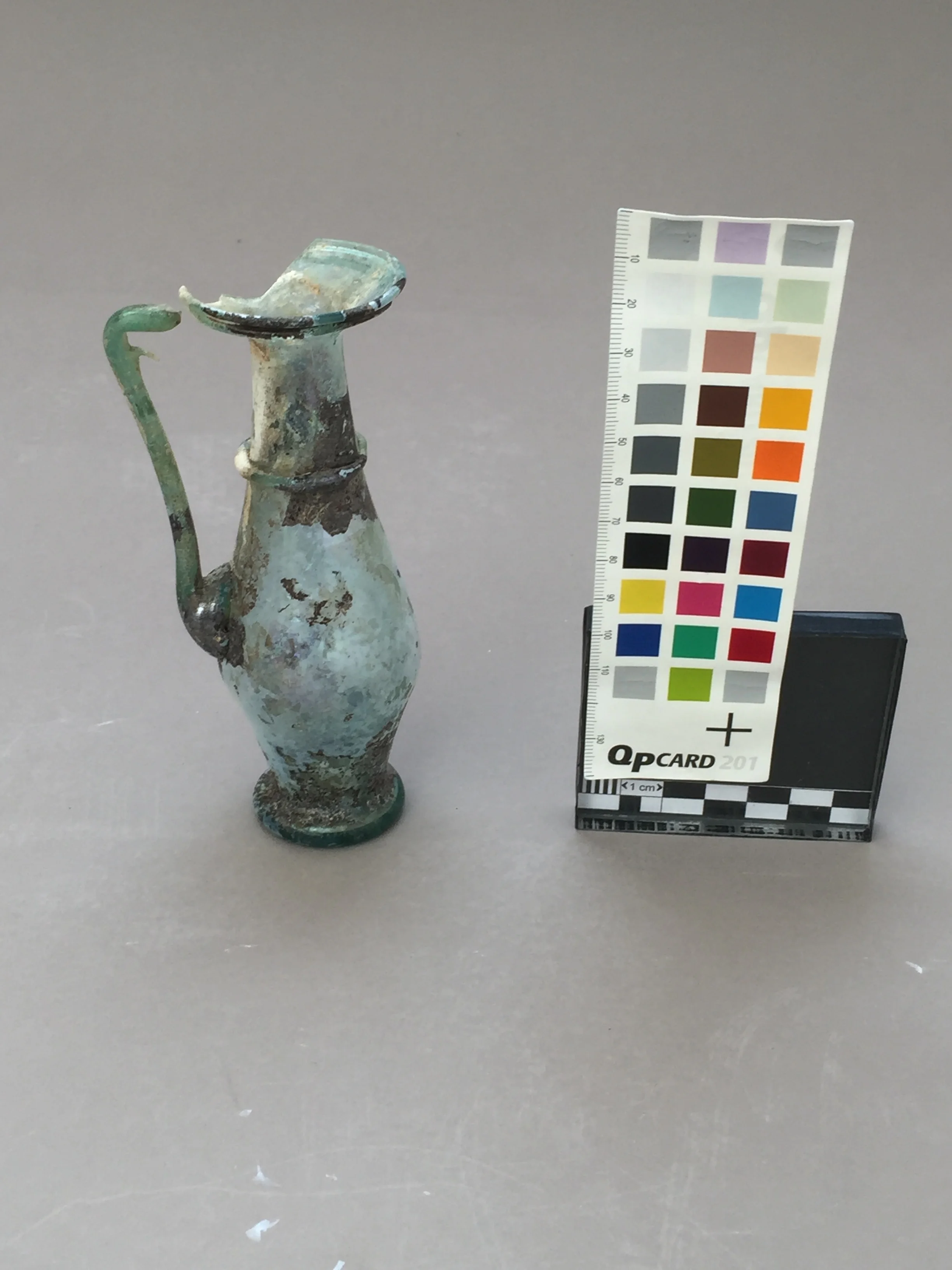  The object before treatment. The section of missing rim is clearly visible.  