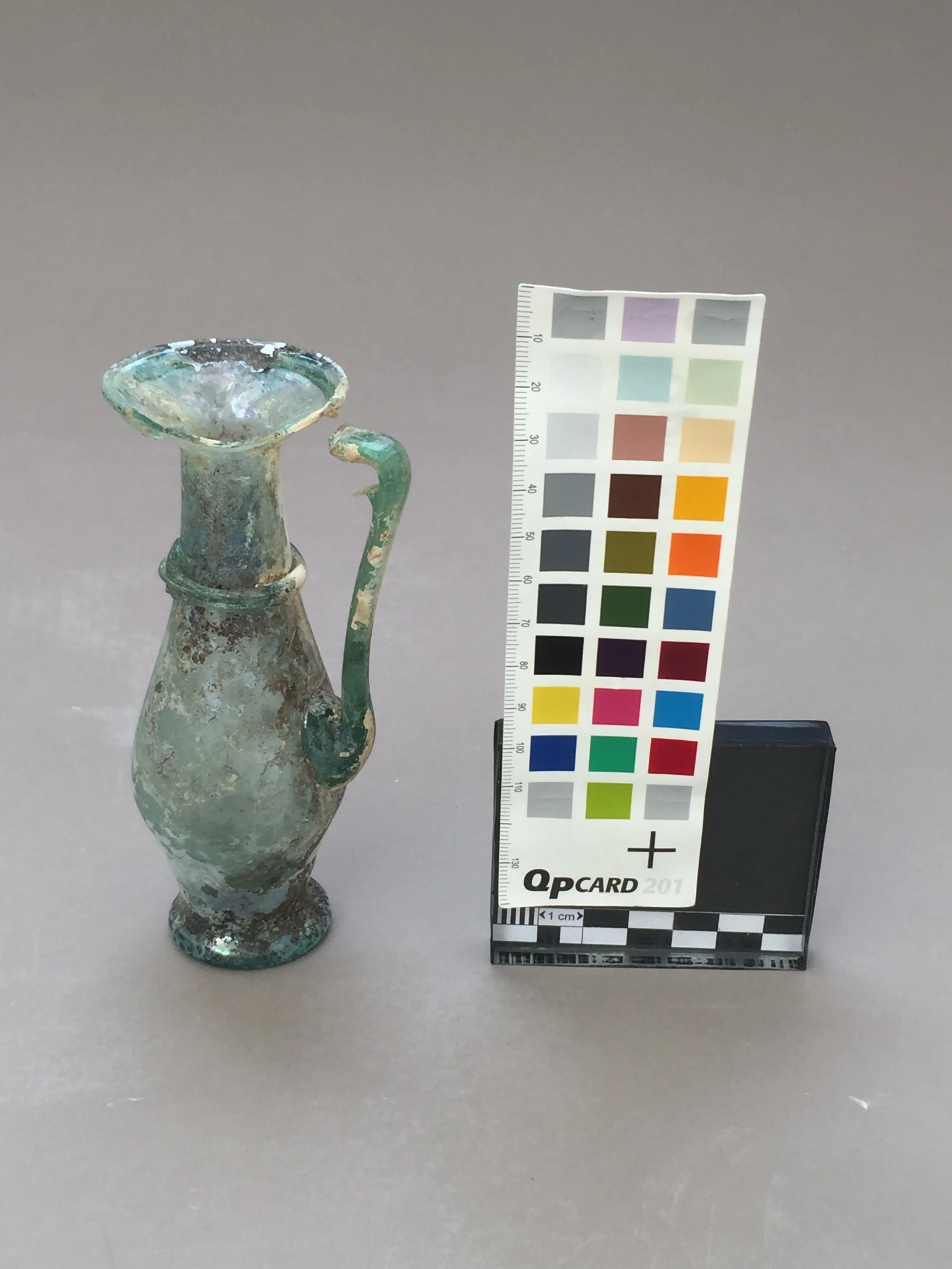  The area of loss in the rim left the top of vessel’s handle unsupported. The object’s surface was also very fragile and friable due to age. The most delicate areas of the surface were stabilized before other treatment could be carried out.   