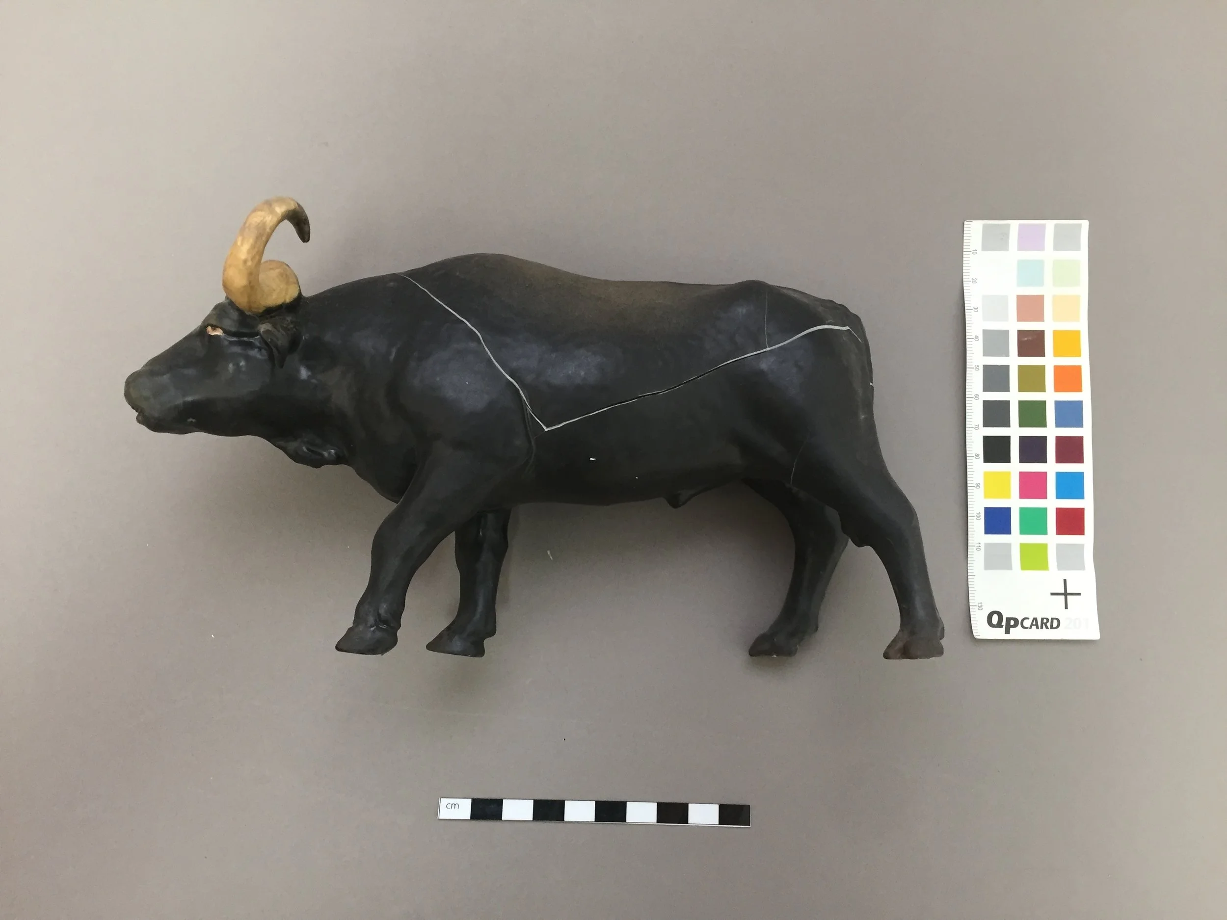  The object before treatment began. This damage was caused by the release of the inherent tension in the clay.  