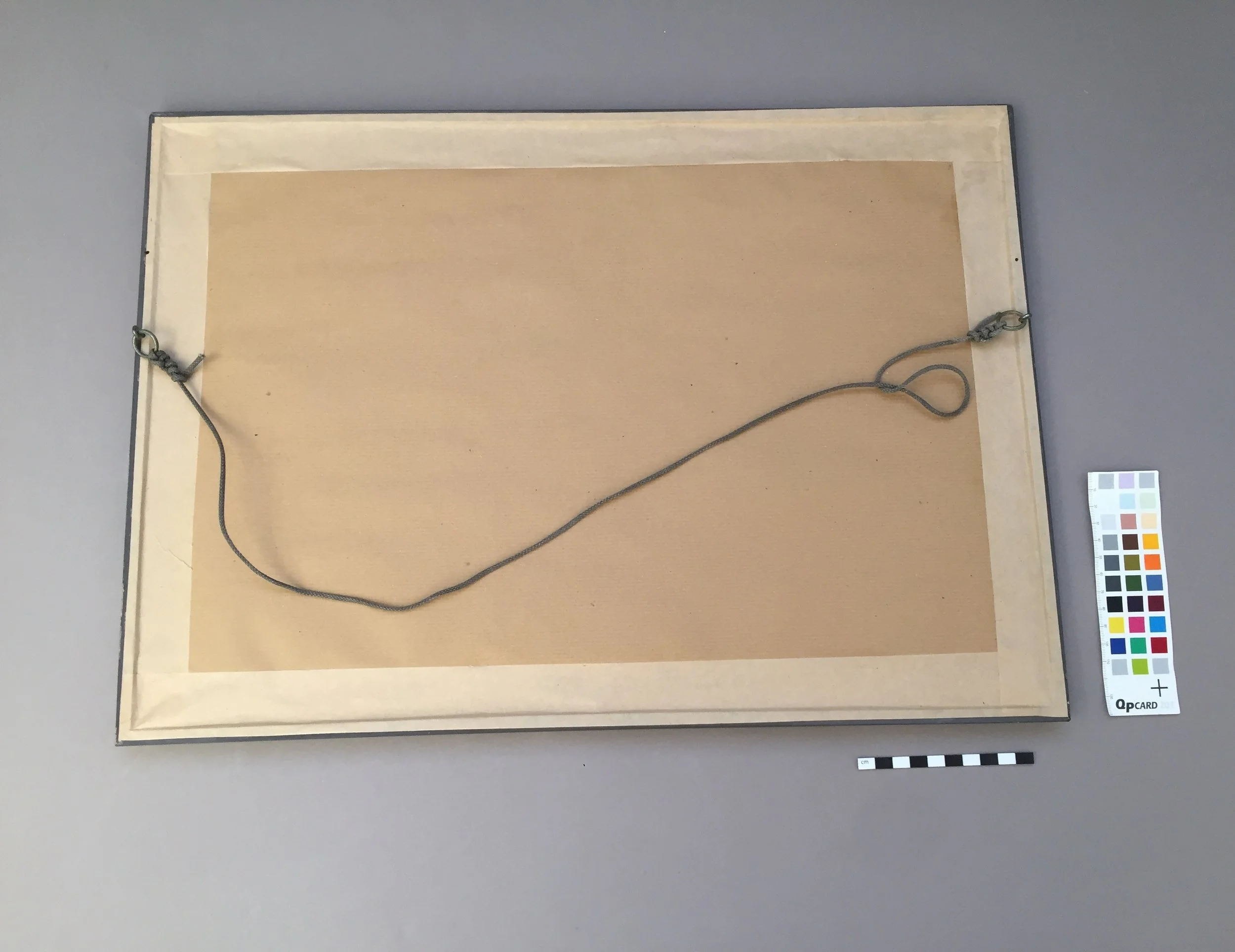  The object was re-backed with archival materials to seal it and protect the glass. 