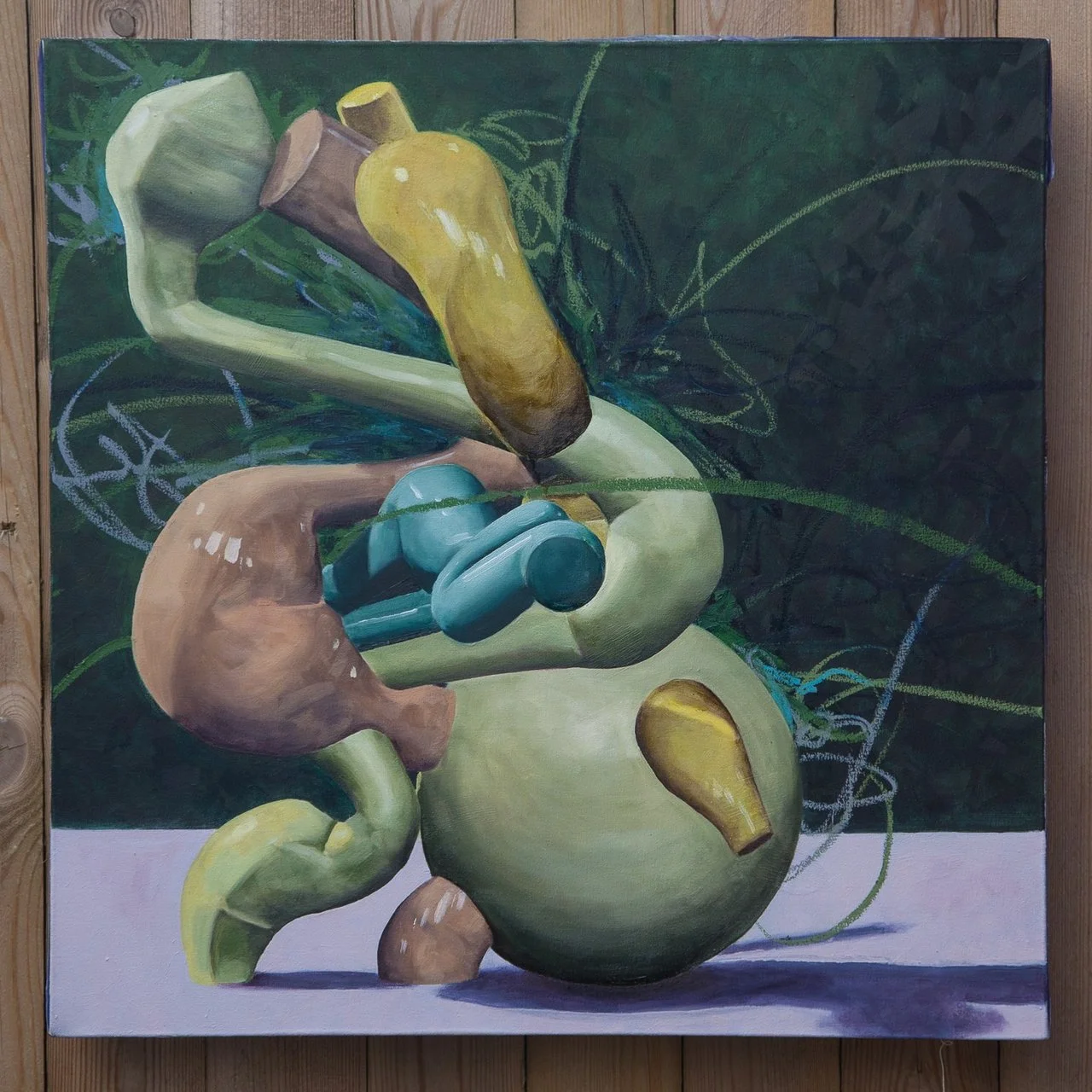 A colorful abstract painting featuring various geometric and organic shapes in shades of yellow, blue, and beige against a dark green background with chalk-like markings.