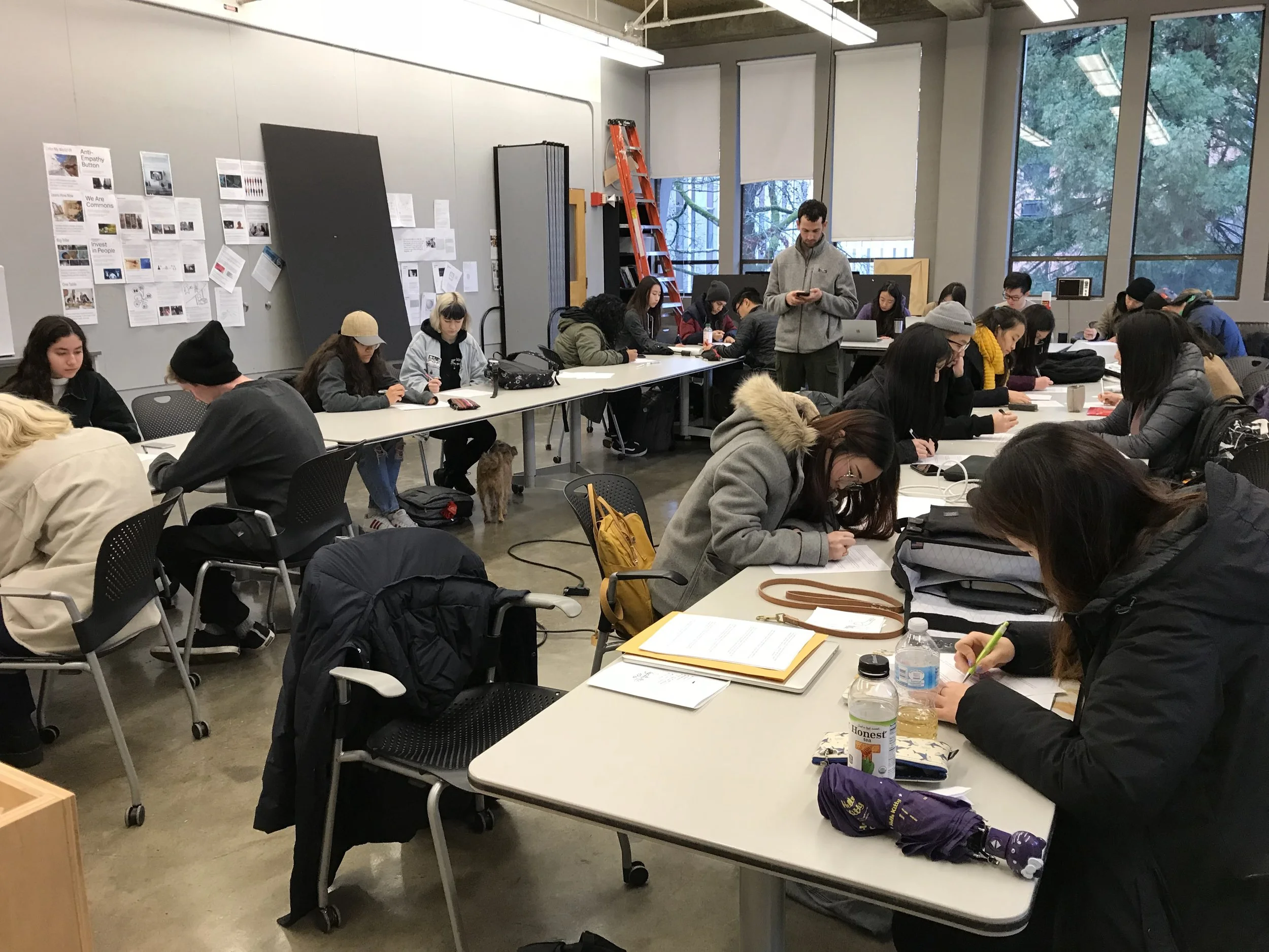Students from DES 166: Design Foundations filling out the questionnaire
