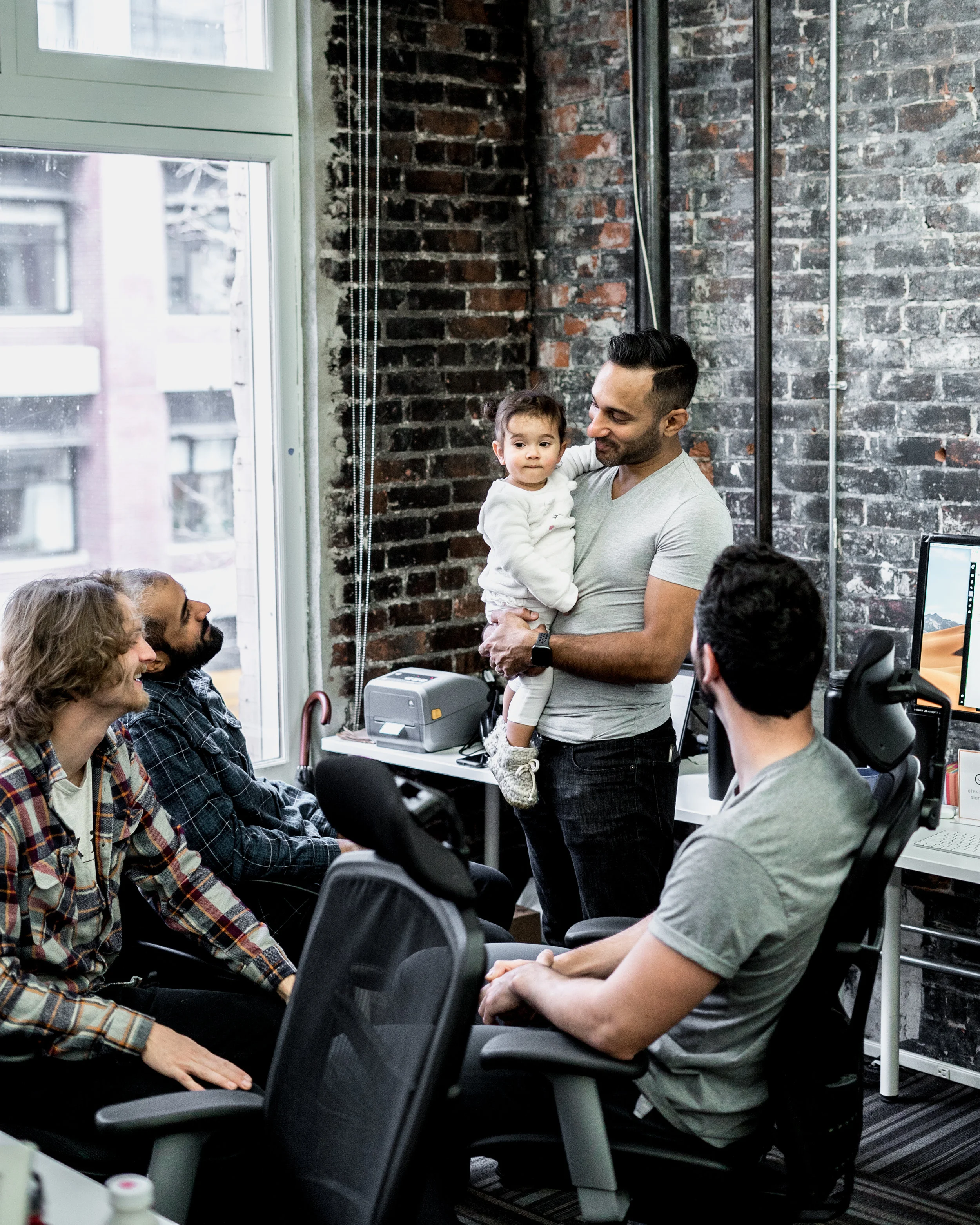 Elevated Signals team pictured with CEO, Amar’s daughter