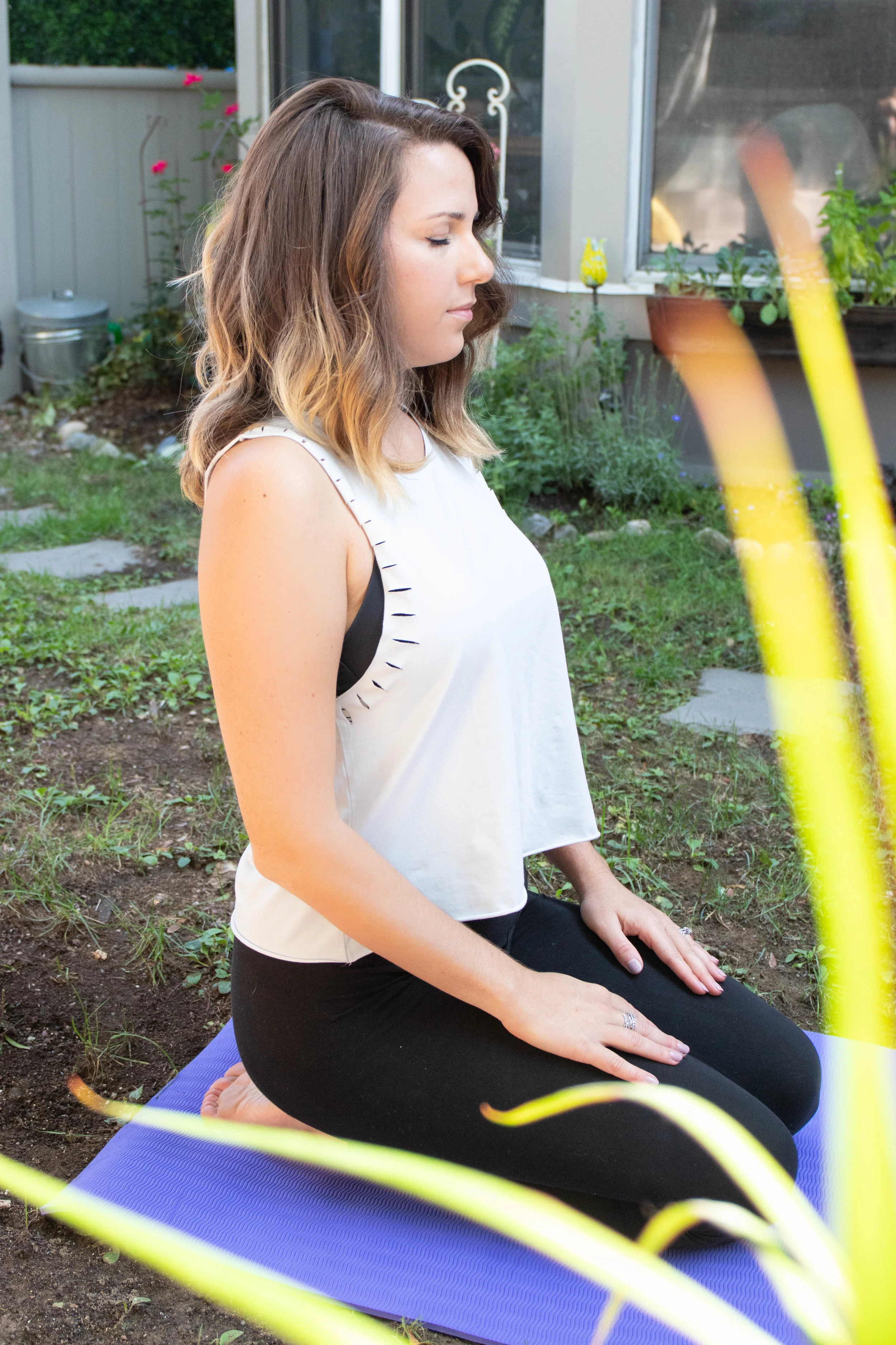 Professional lifestyle portrait of Natasha Wellness health coach doing yoga photographed by Vision Balm in Charleston, SC.