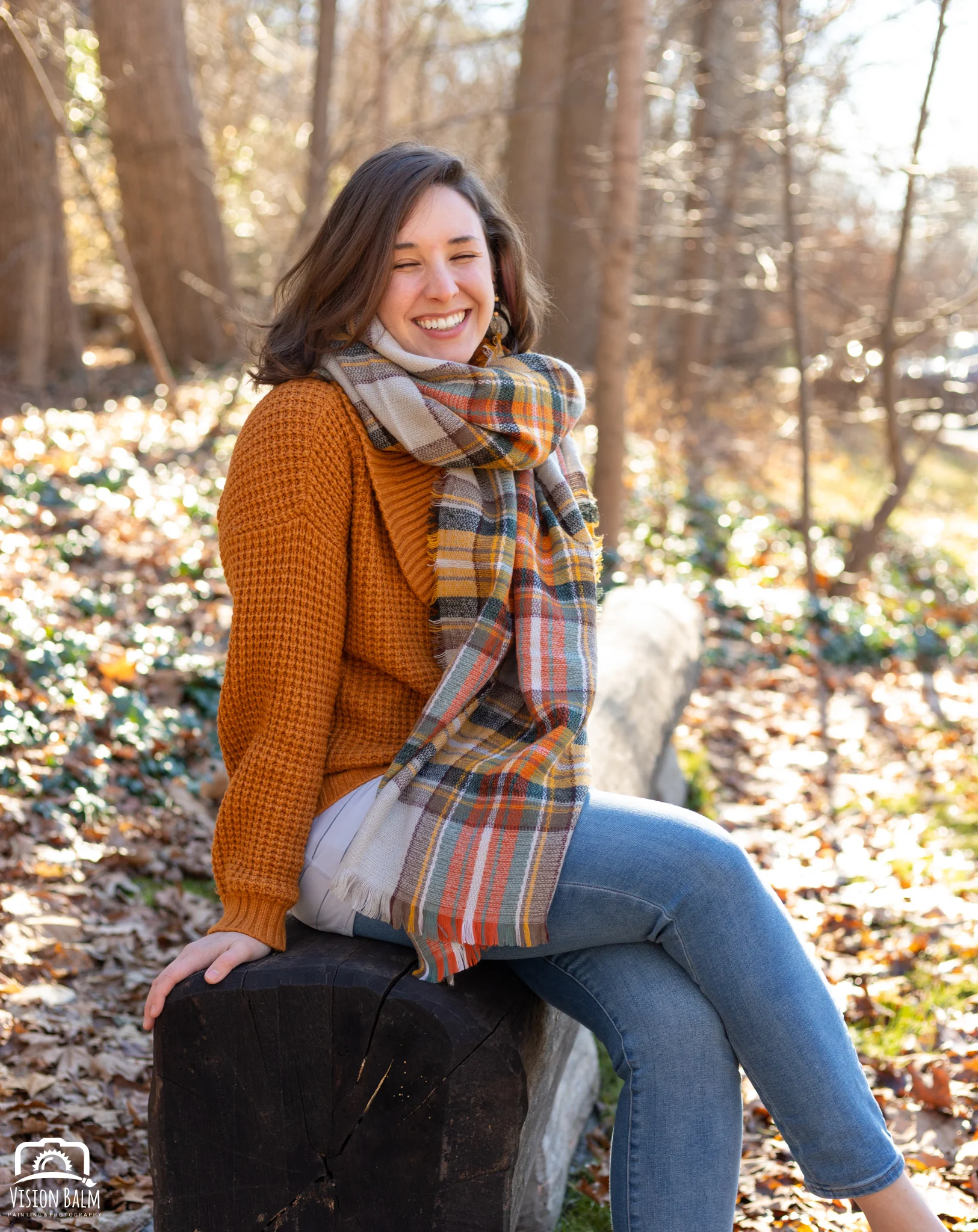 Professional fall portrait photography of Kayla Thornquist wearing an orange sweater in the park photographed by Vision Balm in Charleston, SC.