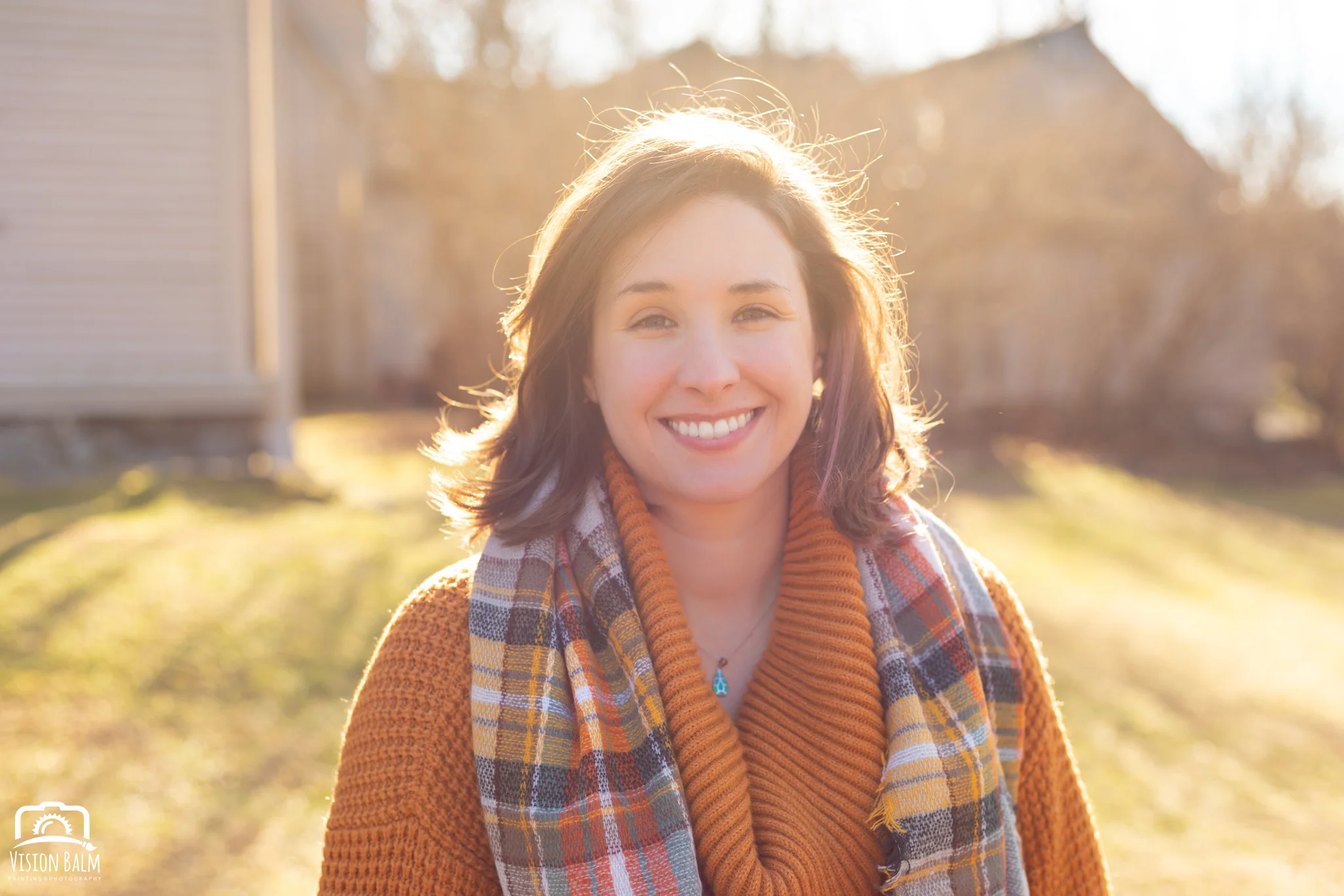 Professional fall portrait photography of Kayla Thornquist wearing an orange sweater in the park photographed by Vision Balm in Charleston, SC.