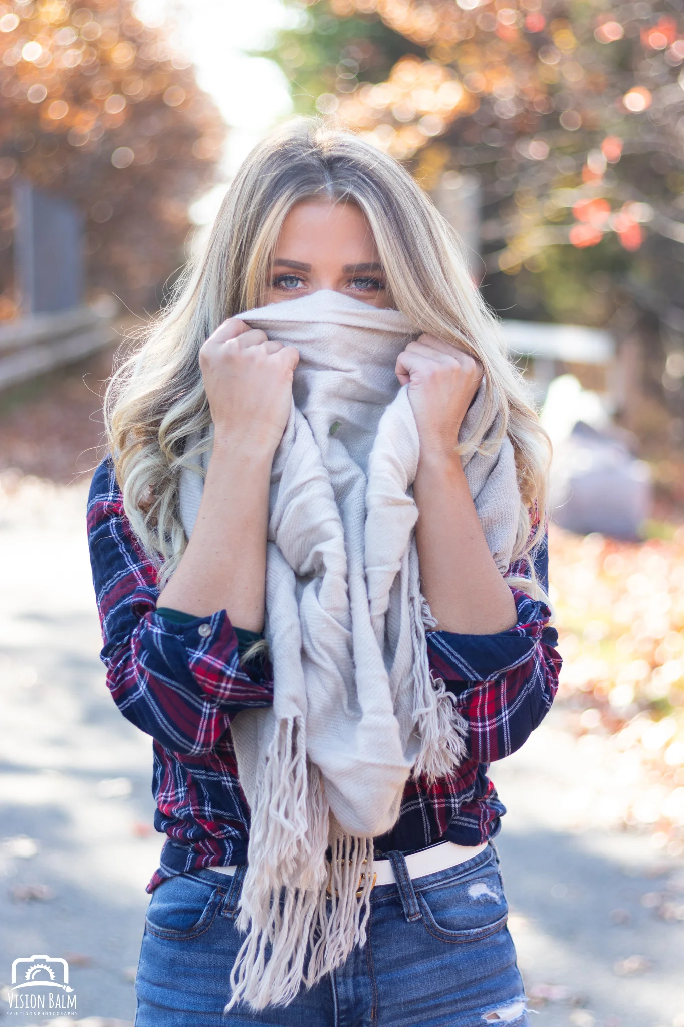 Professional fall portrait photography of model wearing a scarf and plaid shirt photographed by Vision Balm in Charleston, SC.