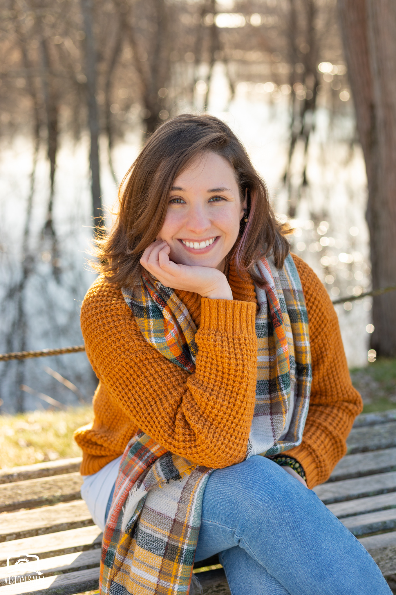 Professional fall portrait photography of Kayla Thornquist wearing an orange sweater in the park photographed by Vision Balm in Charleston, SC.