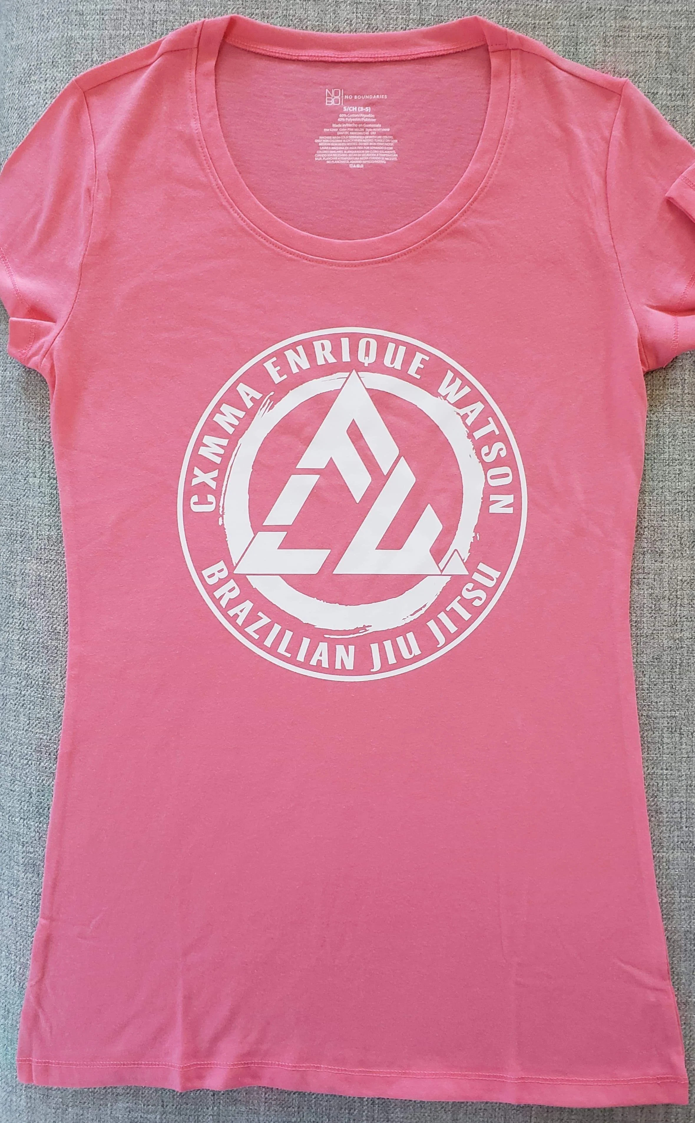 CXMMA Int'l Women's T-Shirt Pink; White Imprint Front Side. 