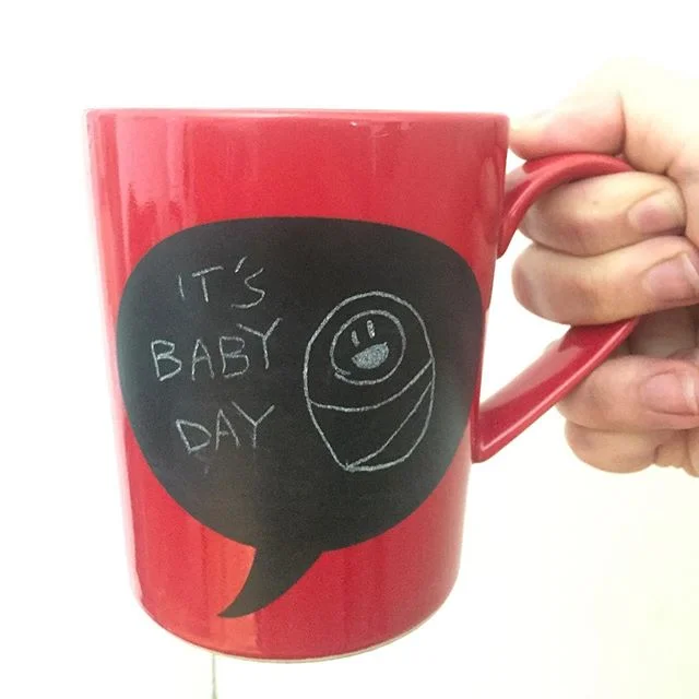 &ldquo;Hey Lass, did you see your mug today?&rdquo;
I sleepily squint at my coffee. &ldquo;It&rsquo;s Baby Day.&rdquo;
&ldquo;Do you know what that means?&rdquo;
I scan my pre-coffee brain for context clues. Was the cat complaining all night? Oh no, 