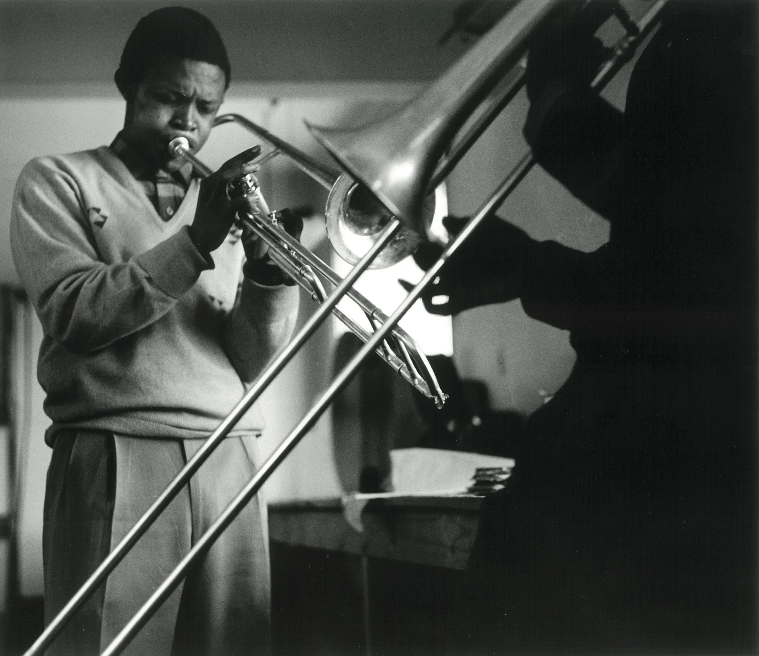 1956 – Hugh Masakela and Jonas Gwangwa practice at the Bantu Men's Social Club, Johannesburg Courtesy of the Estate of John Goldblatt