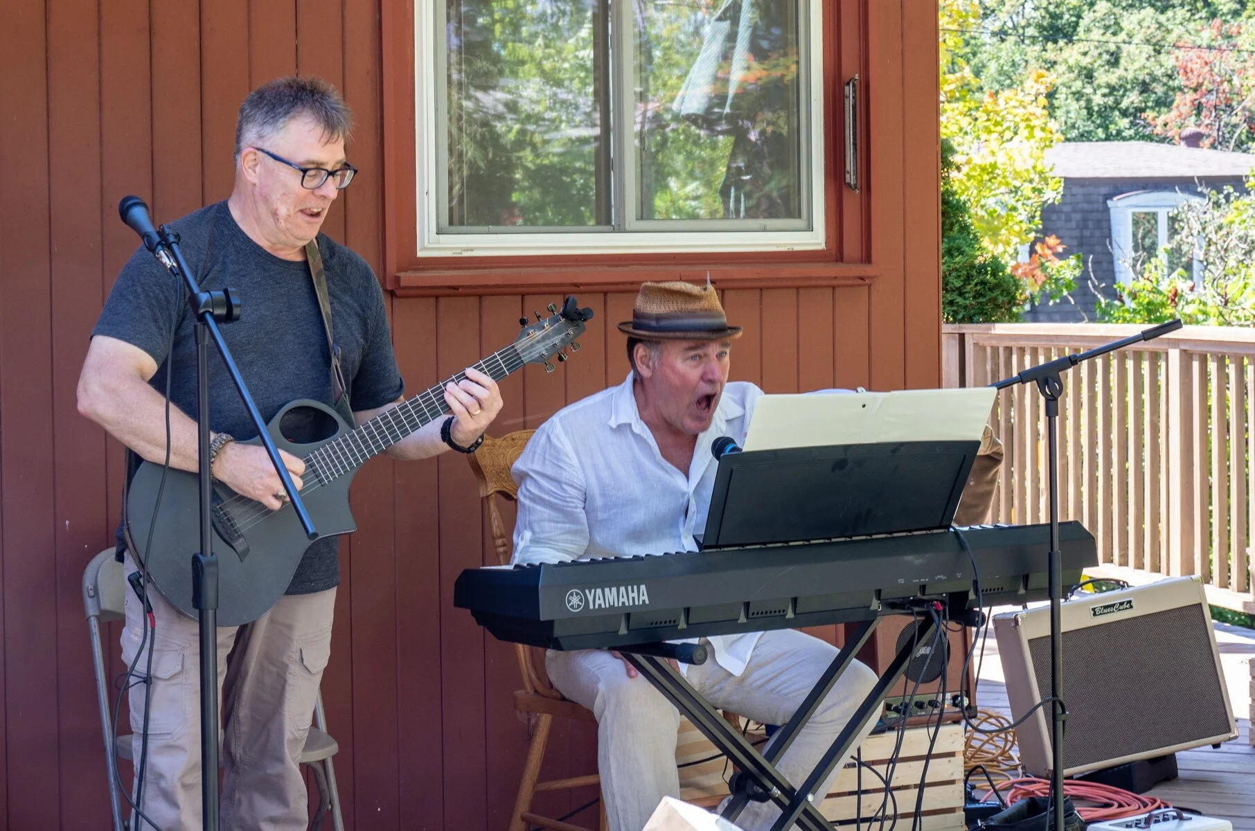 the two petes - pete belting out a tune accompanied by guy
