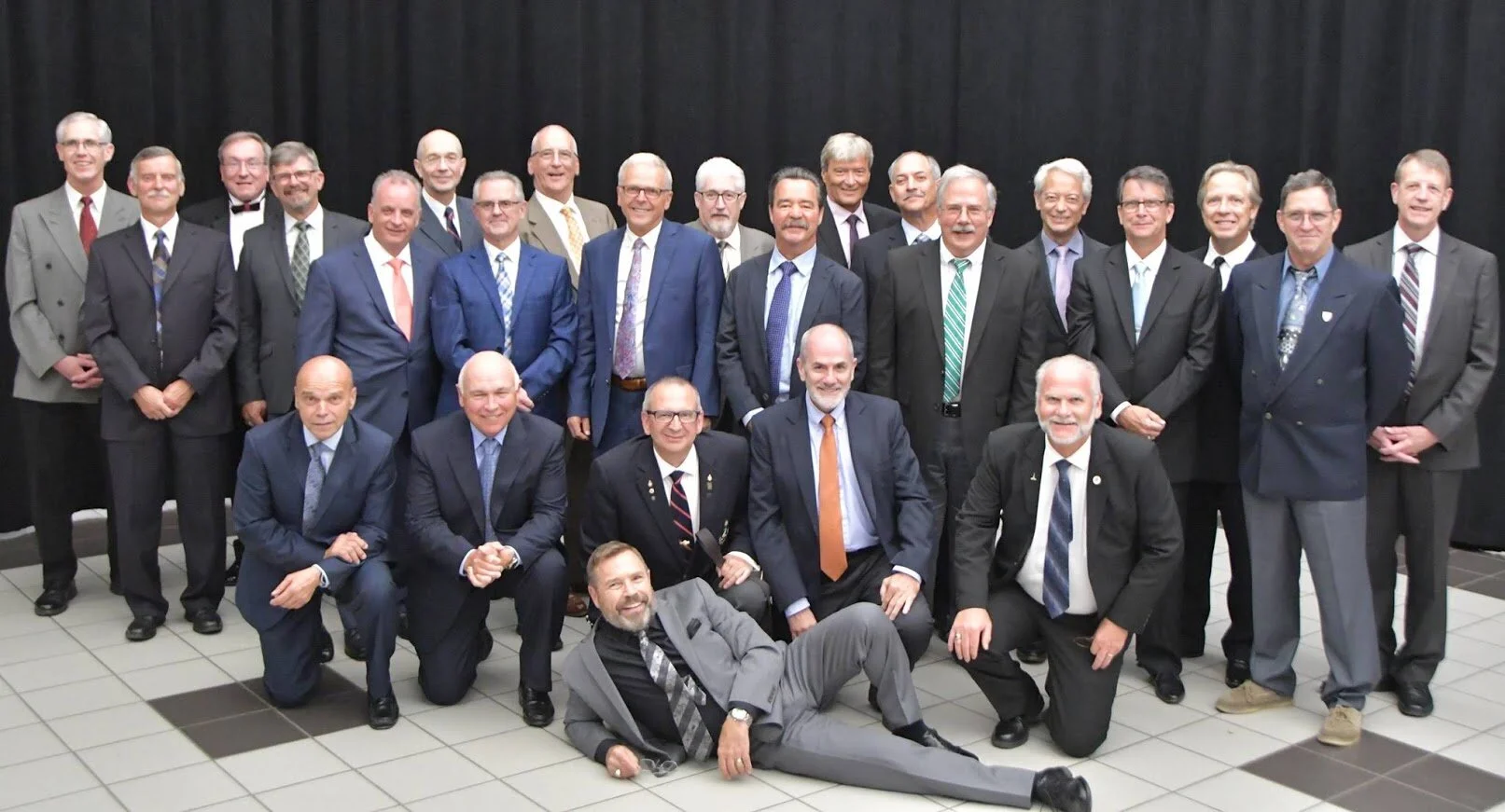 CMR 40th Group Photo Guys.jpg