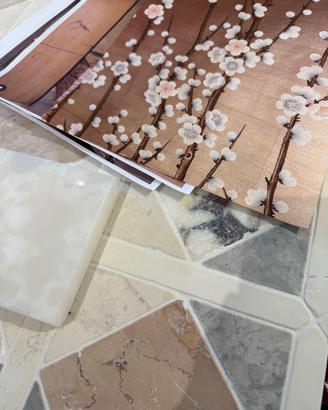 A powder room that proves small spaces can be impactful.  #tiletuesday