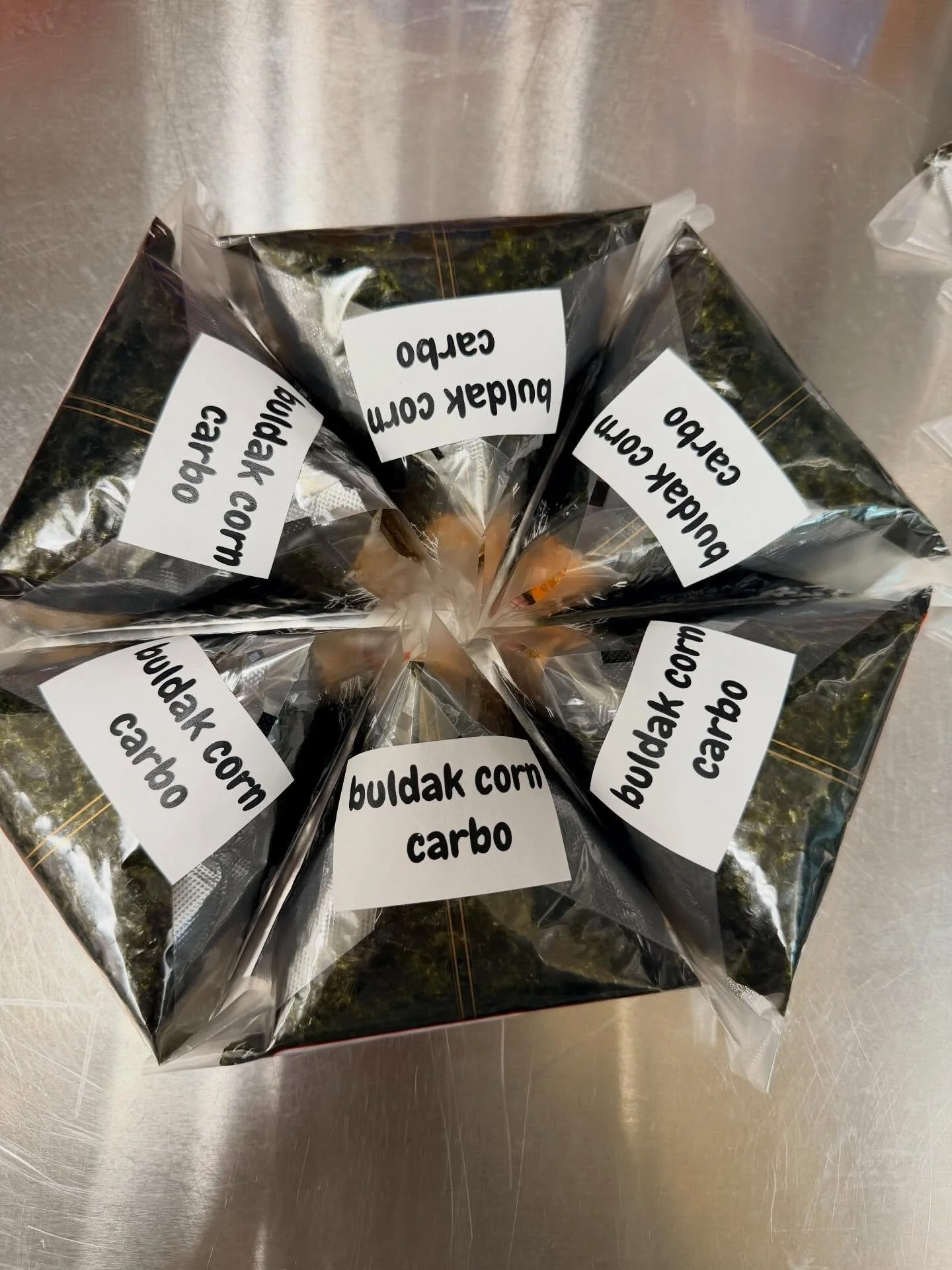 New triangle: Buldak carbo corn! It&rsquo;s spicy! It has corn! It has cheese !

&ldquo;So fire&rdquo;
&ldquo;You ate&rdquo;

Come try for yourself!

NOW OPEN 7 DAYS A WEEK 

Tuesdays are restock days

True Kimchi Korean Cafe 
📍2805 E State Blvd For