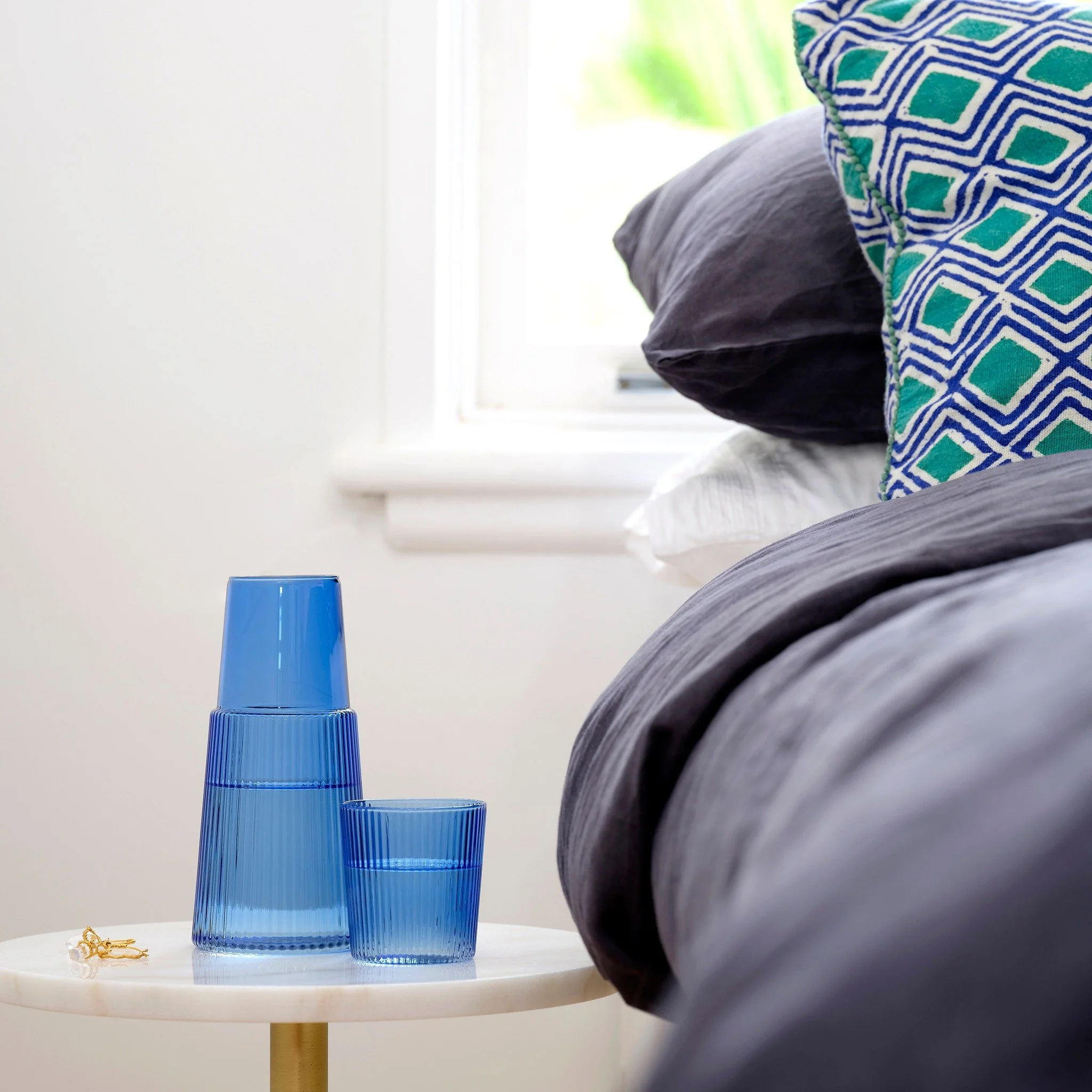 ✨ Introducing the stunning Narcisco Carafe by @noritakeaus 🌿 Crafted with elegance, this Italian-made beauty is now available in a chic blue shade (also comes in green and amber!). Perfect for adding a touch of sophistication to your hydration stati