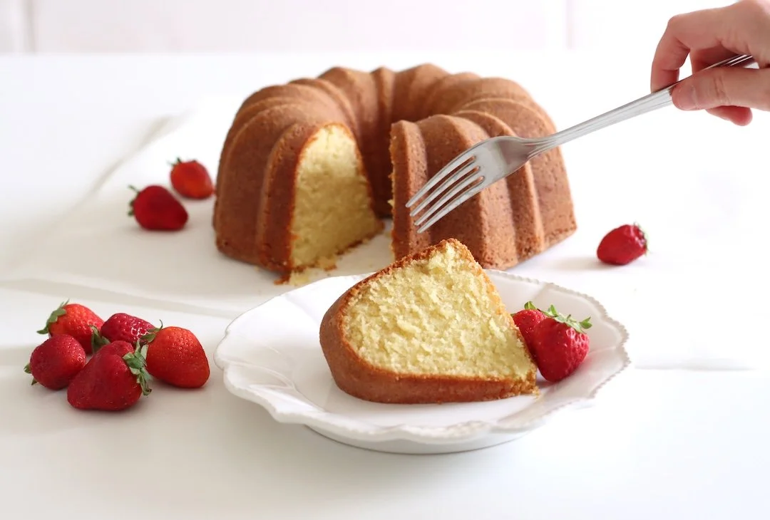 A pound cake made using a bundt pan