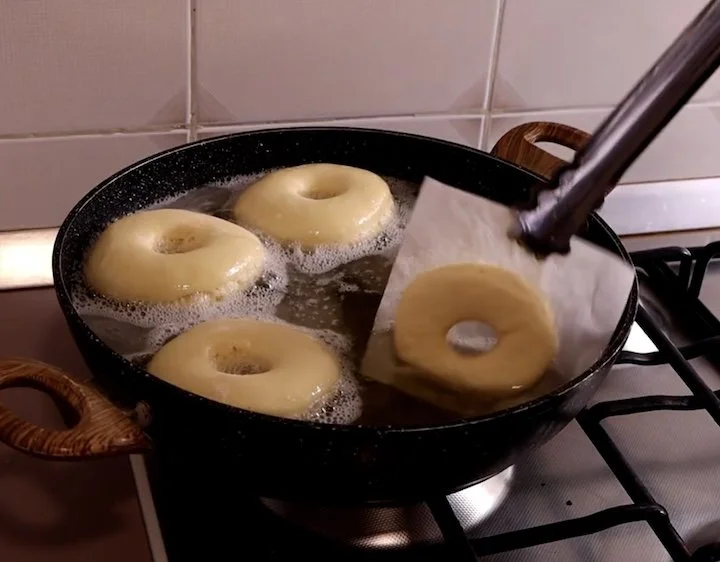 Frying the donuts