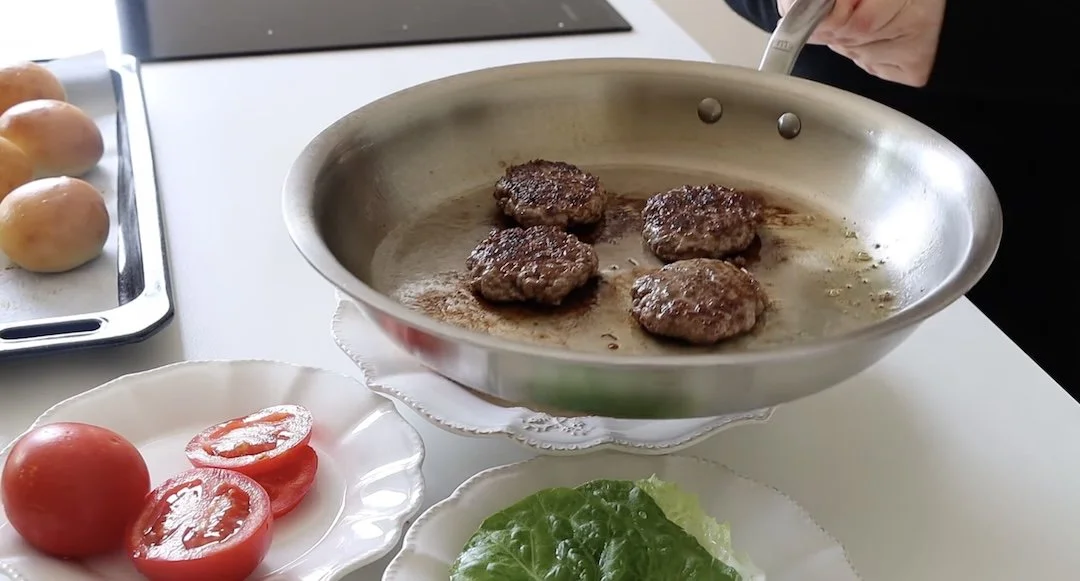 Slider patties in a stainless steel pan