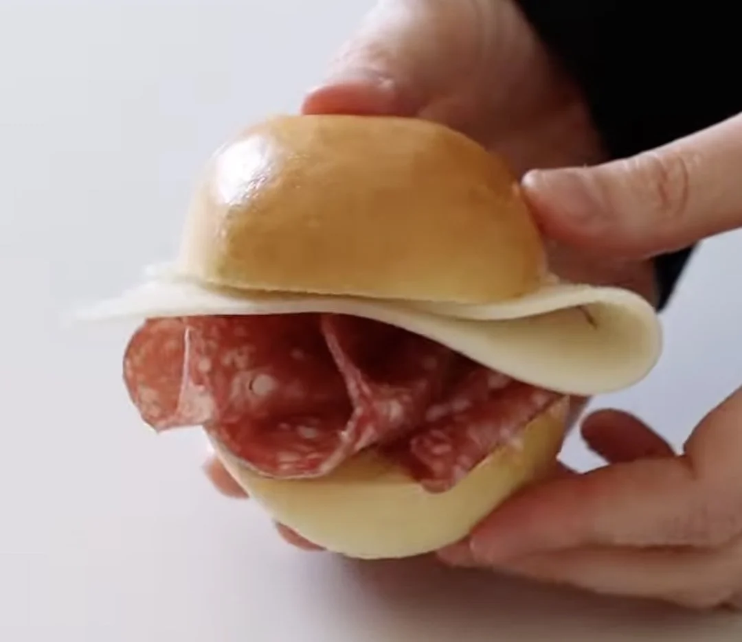 A simple Italian sandwich with salami and cheese