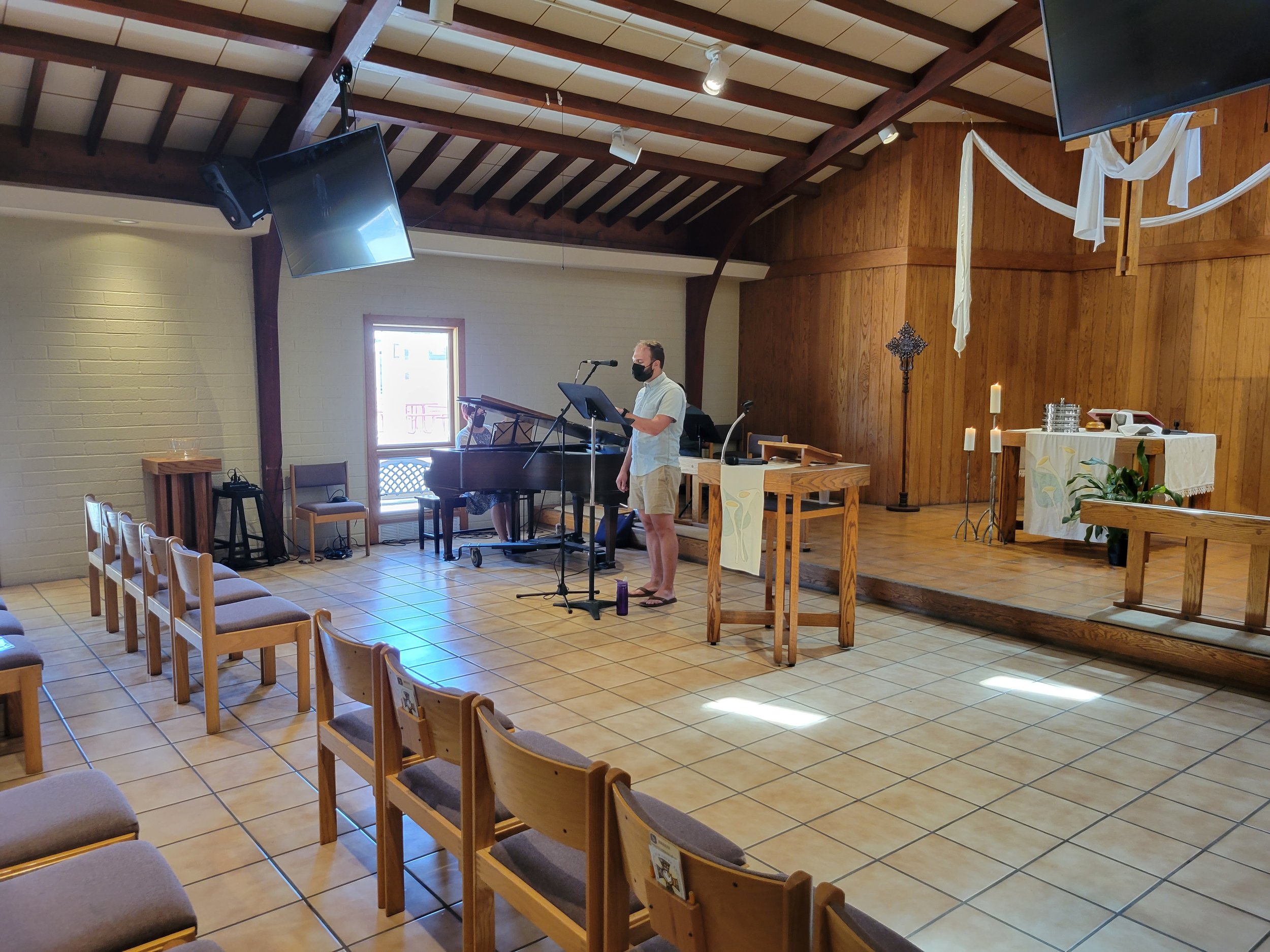 Mic set up during rehearsal, mics on Altar and Lectern