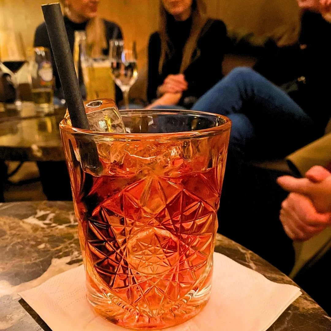 Cozy up with us by the fireplace at Kaminbar this Friday! Join the warmth and good vibes 🥂

Since 2018, our mission has been to create a welcoming space where both international locals and local internationals feel empowered to step out alone and co