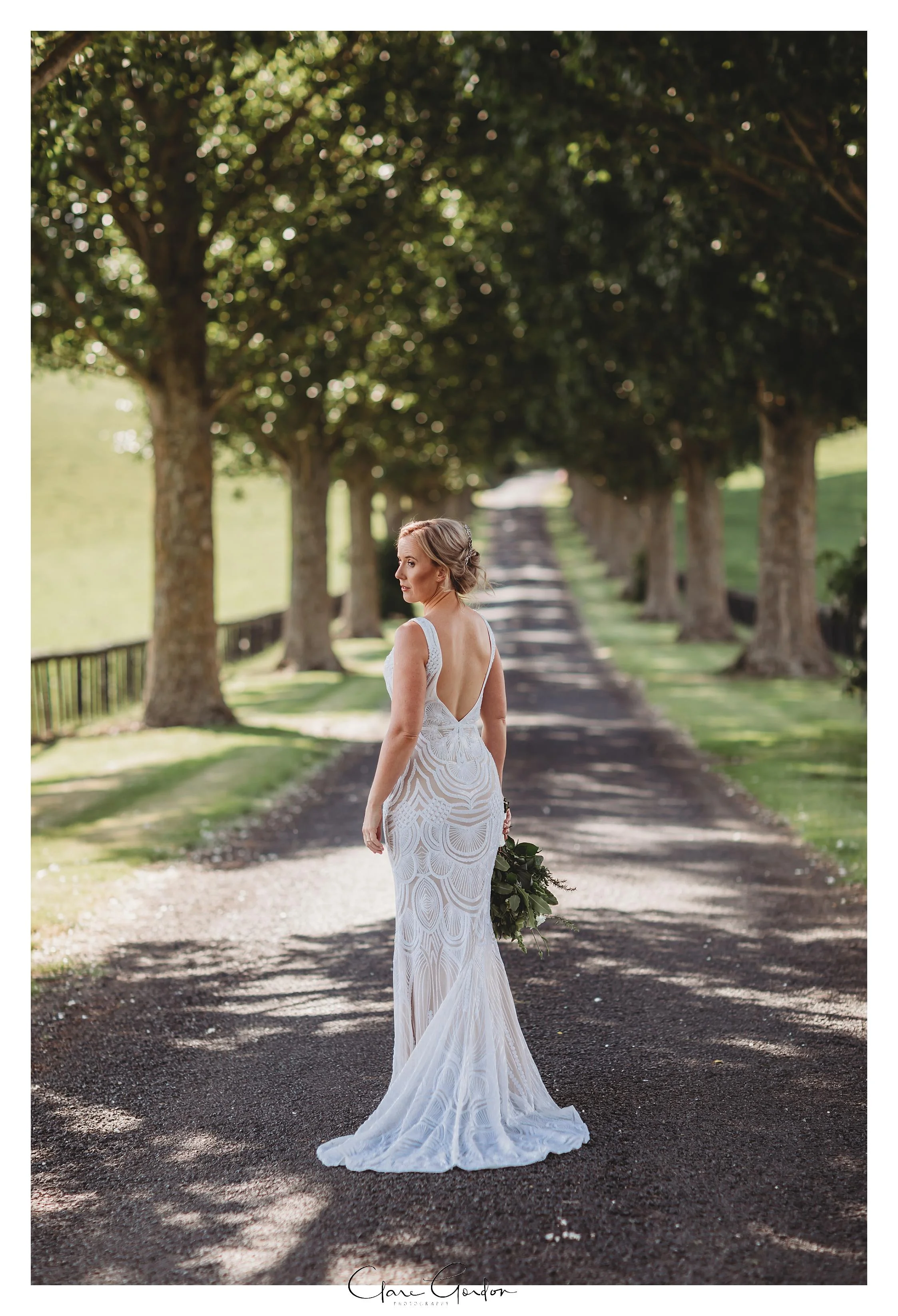 Red Barn-Wedding-Waikato-wedding-bride-on driveway (77).jpg