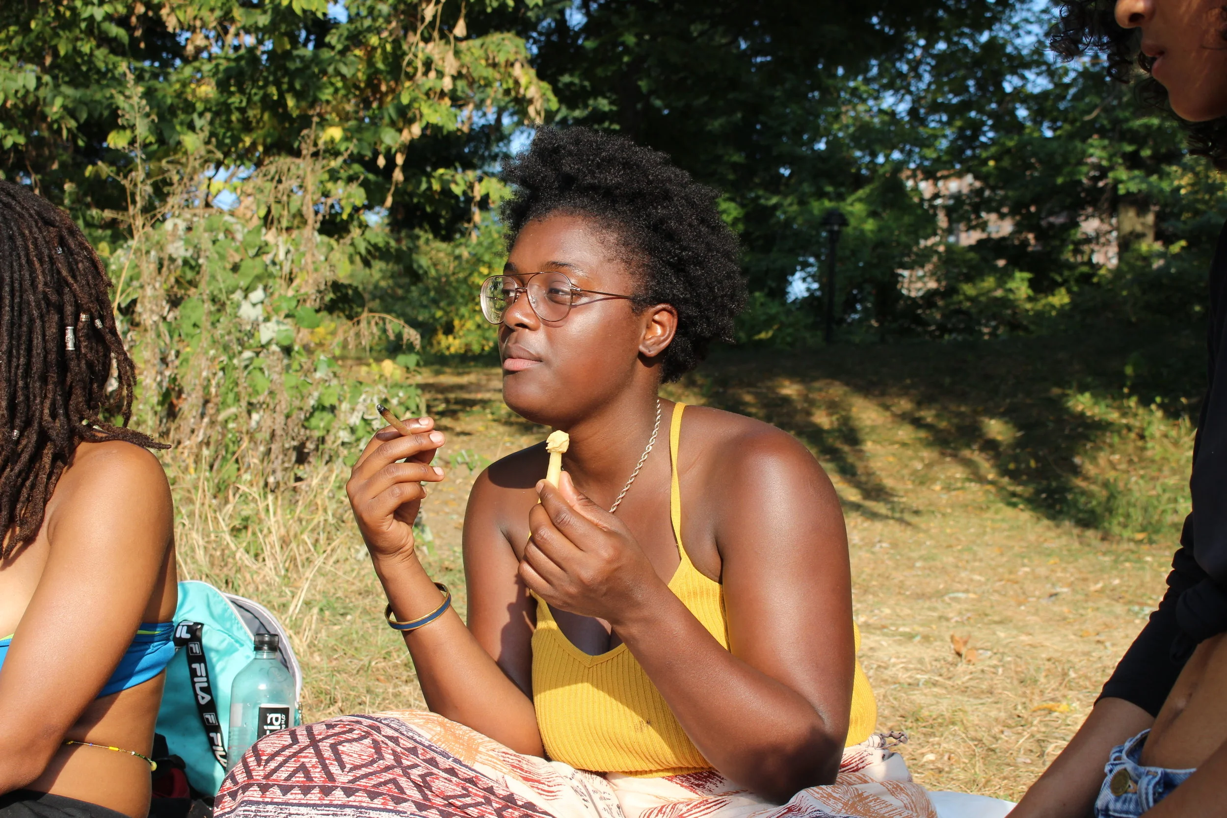 Participant listens attentively as others share experiences. It is Rocky’s first time attending Flo’s workshop, but has been practicing spirituality and Yoruba traditions for 5 years. She comes to NYC from Brown University once a month to participate in a spiritual event and engage with her community.
