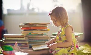 child-reading-stack-300x180.jpg