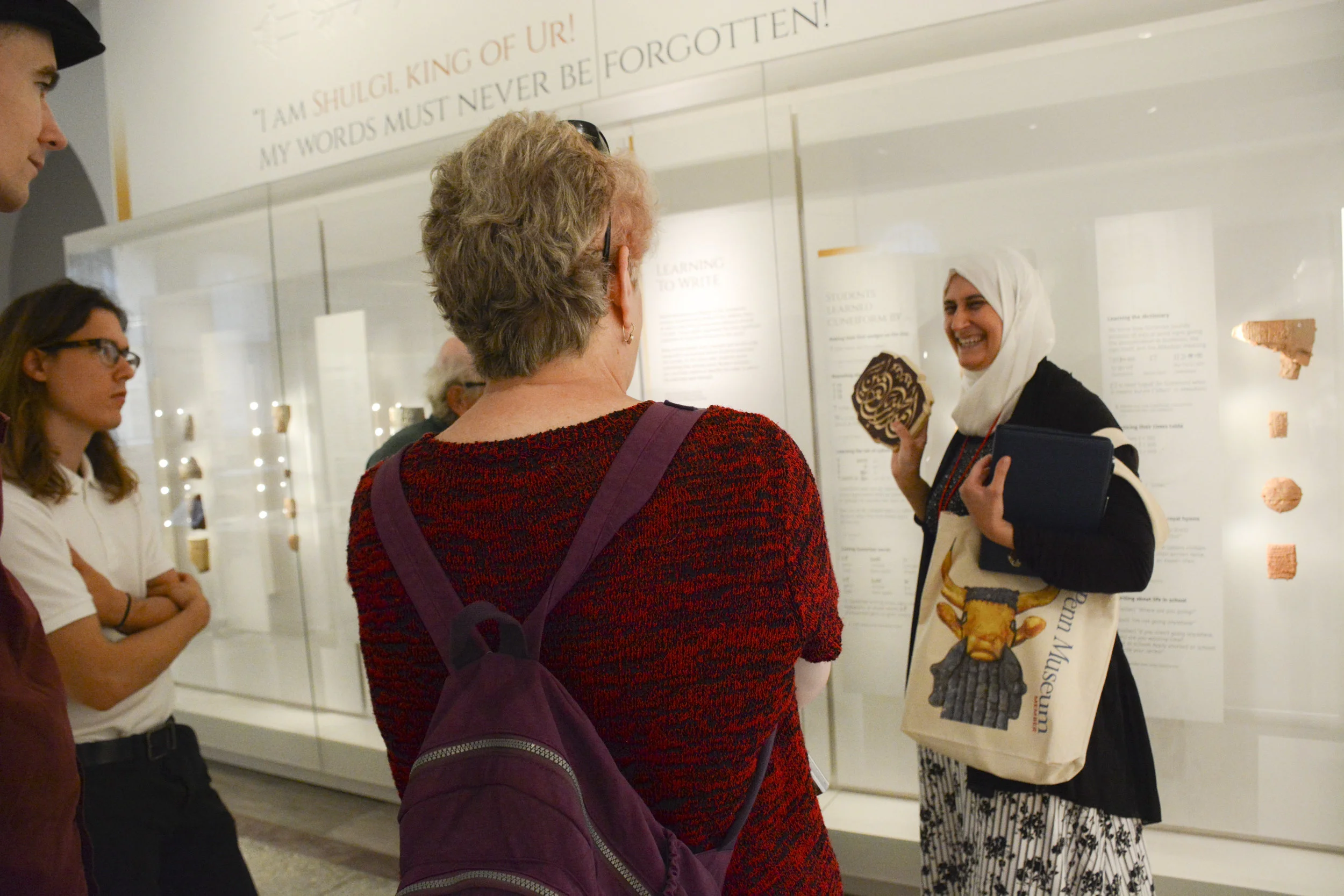 Moumena Saradar explains the writing style of ancient Mesopotamia and contrasts it with contemporary Arabic calligraphy. Image courtesy of the Penn Museum.