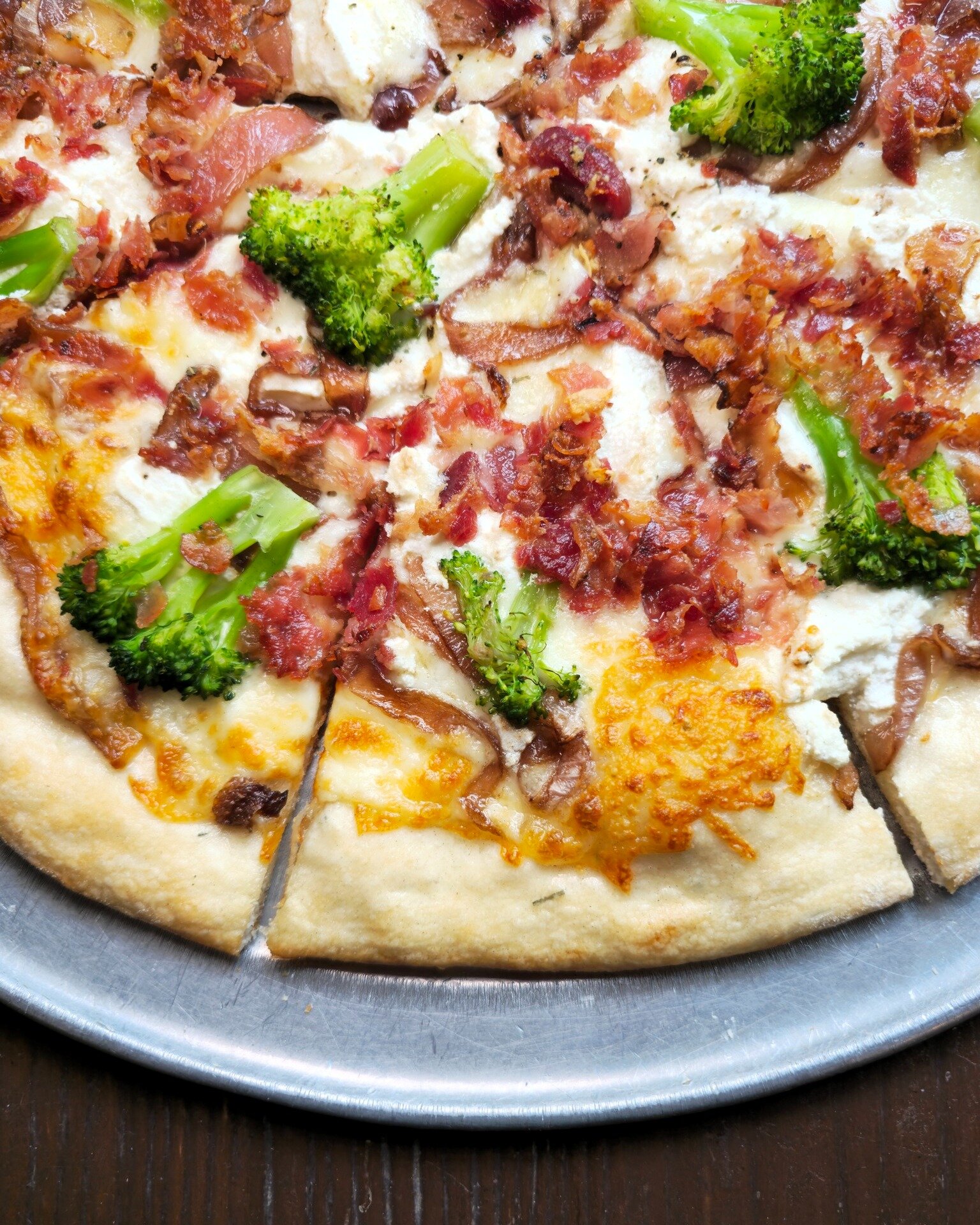 Parting is such sweet sorrow! Today is the last day to try the Bacon Broccoli pizza. Smoky bacon, fresh broccoli, caramelized balsamic onions, + ricotta are a combo you won't want to miss!

We are also pouring $6 glasses of red and white sangria with