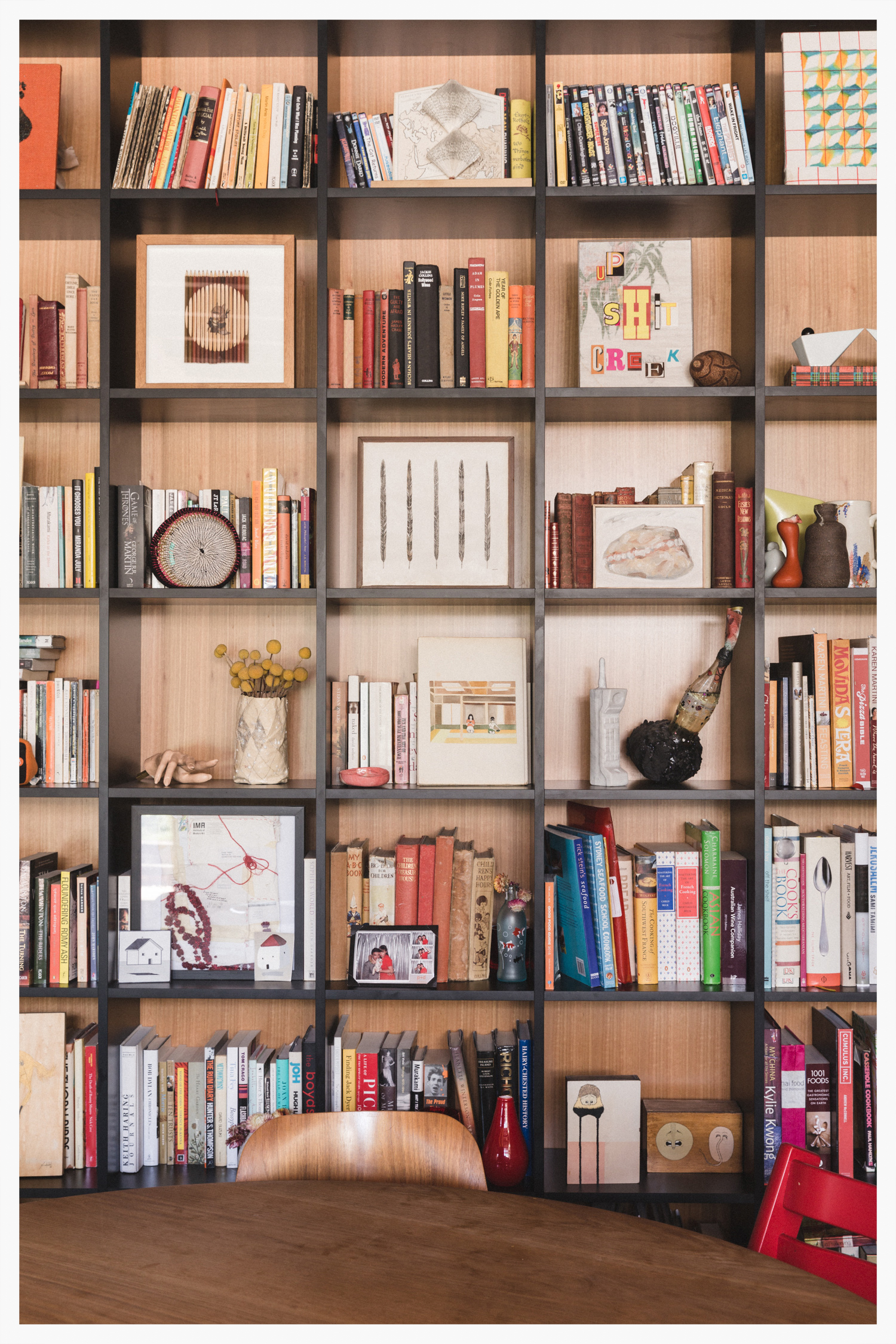 Artwork credit: (Top shelf) Sculpture by Nicholas Jones (Second shelf down) Ghostpatrol and Jon Campbell (Third shelf down) Miso and Eleanor Butt (Fourth shelf down) Tai Snaith and sculptures by Nick Waddell and Simon Perecich (Bottom shelf) paintings by Robert Bowers.