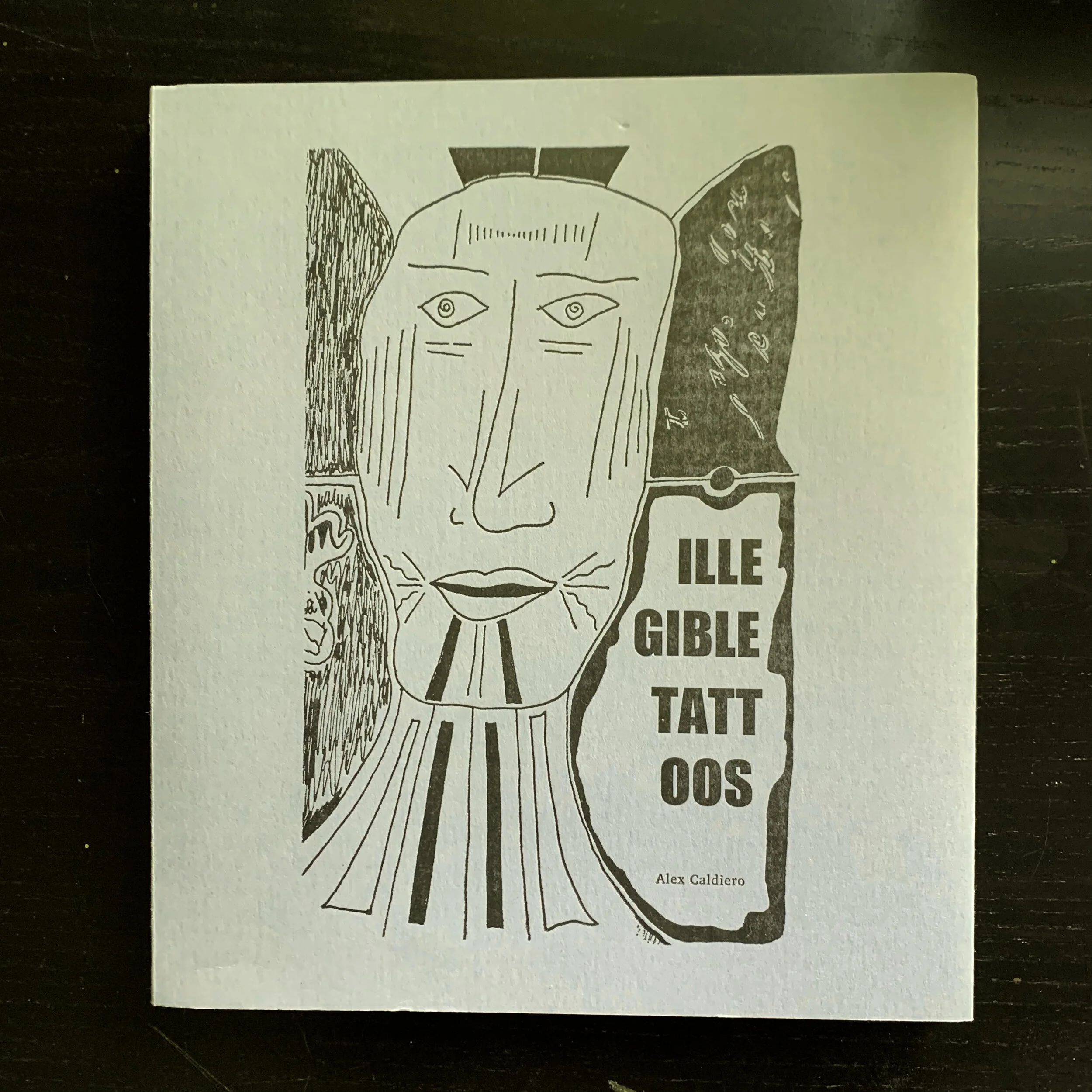 Illegible Tatoos.jpg