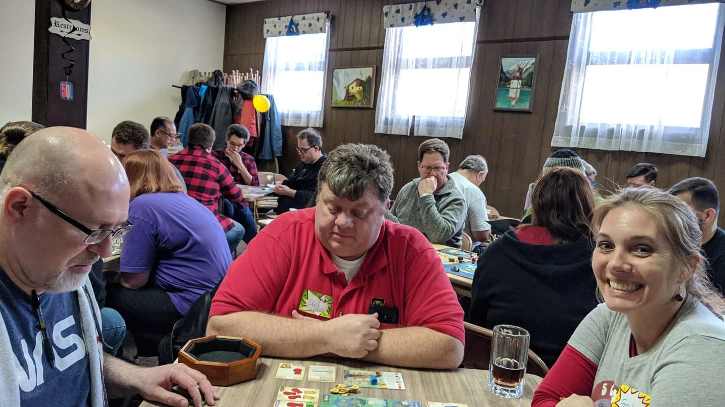 Cindi taught Scott Cozzilio from Epic Loot, Chris Funk and Emily Detmer — Herbacious Sprouts. We recently picked it up and had been playing it a bit. You can see me in the background playing my roll-and-write marathon.