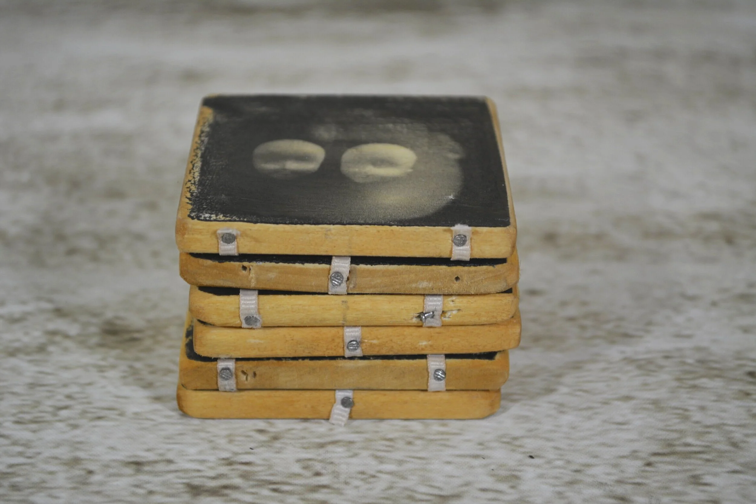  Jacob's ladder toy with photo transfer on wood 