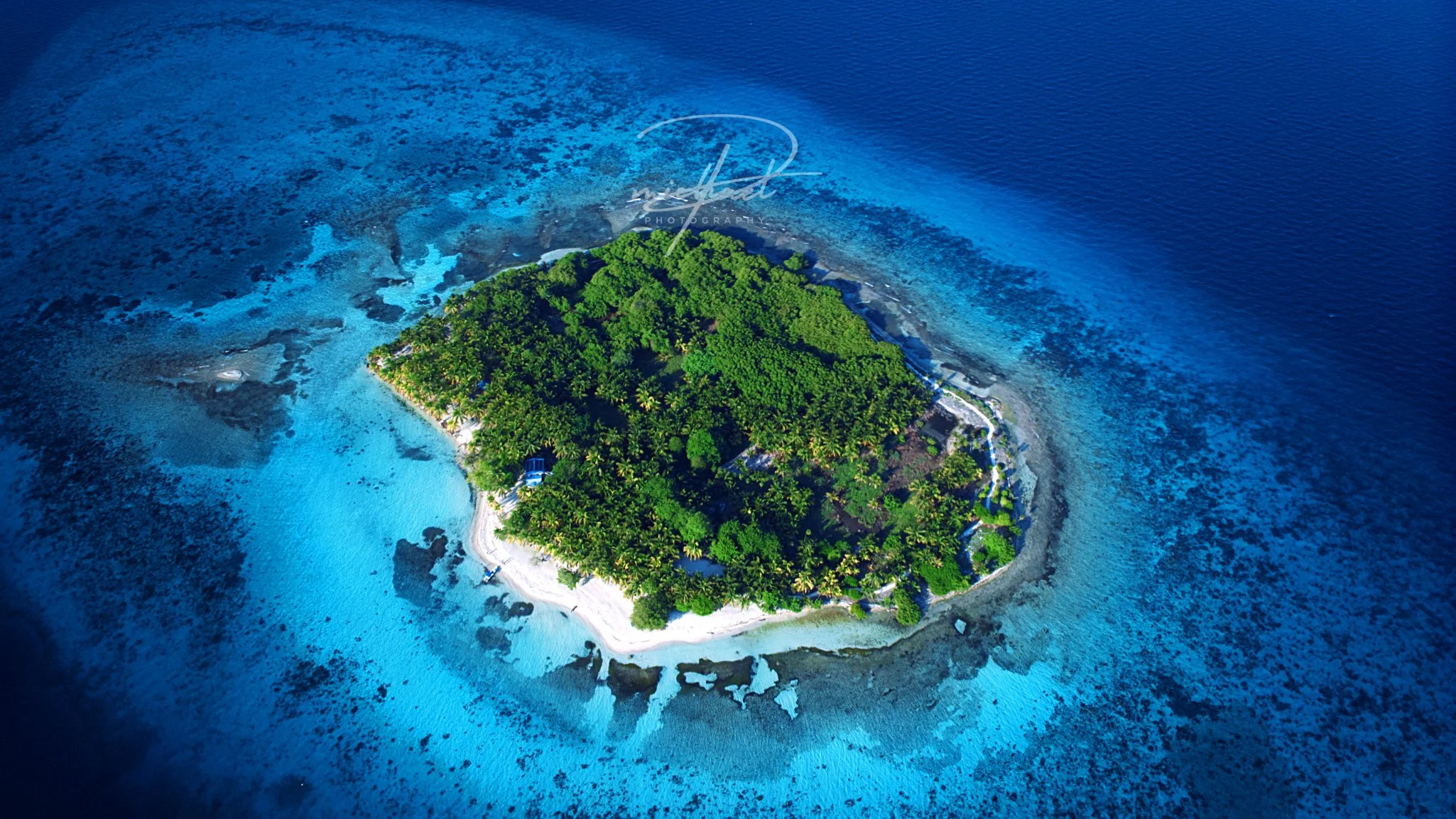 Michael Palacio Photography is the best Island Real Estate Photographer in Belize. This photo is a drone photo of Moho Caye. This Caye is outside of Placencia Belize. This photo was also taken by Michael Palacio Photography