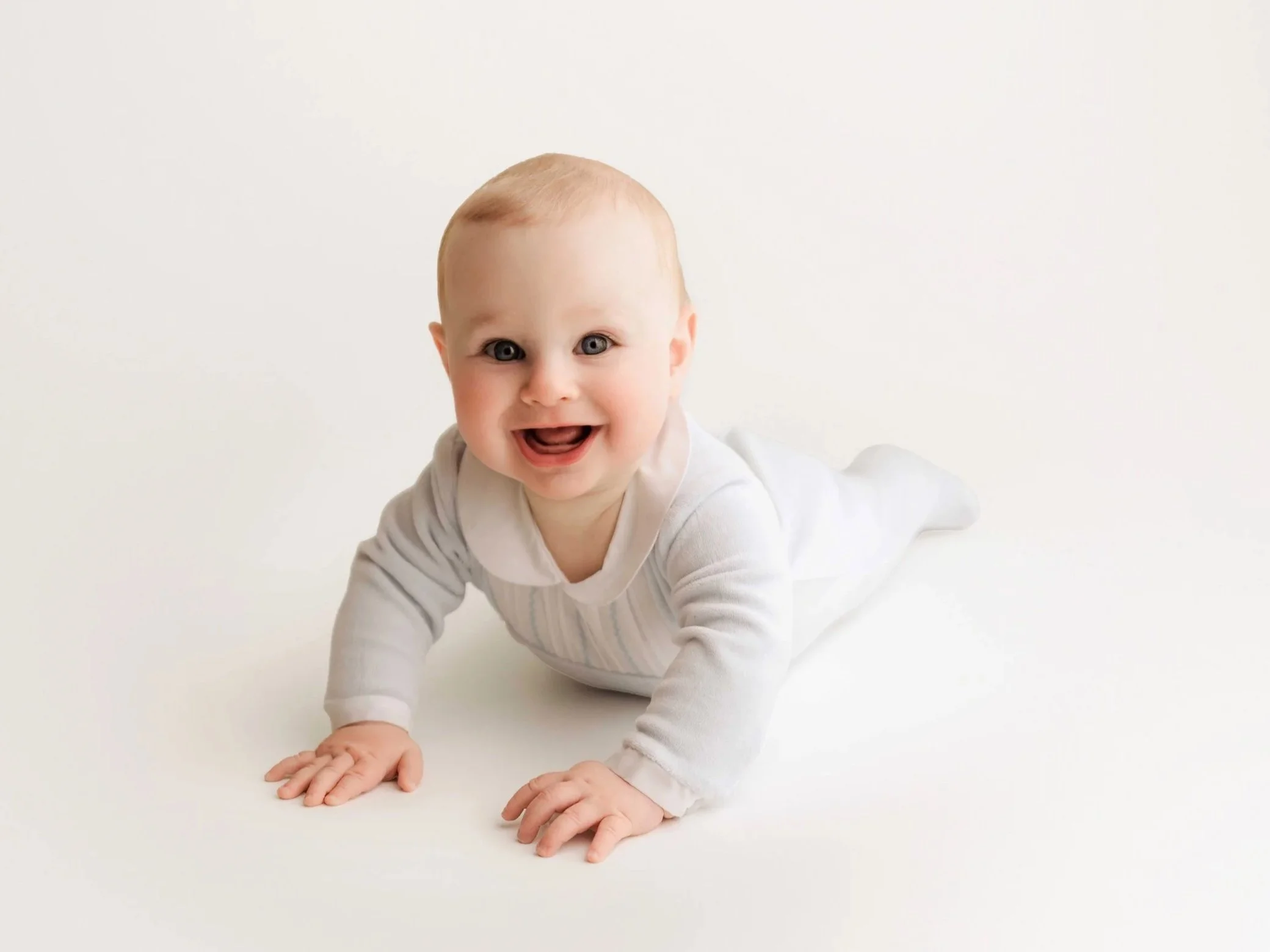 six-month-old boy poses on tummy in ridgefield, ct studio