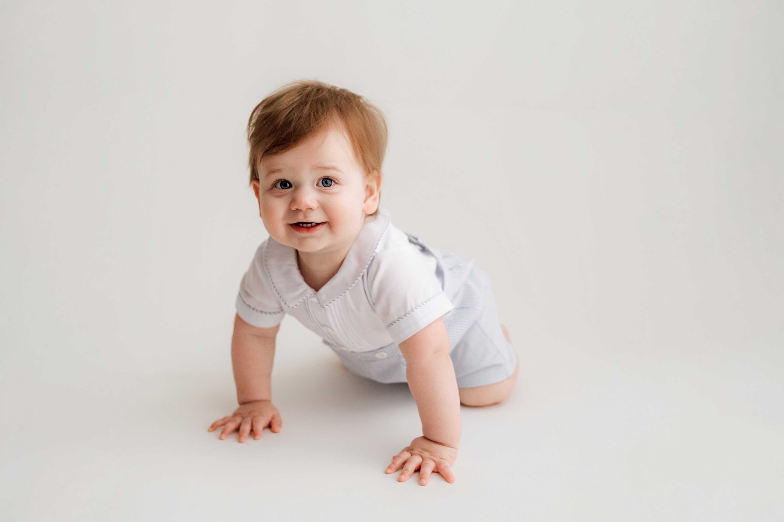 baby boy crawls toward camera in ridgefield, ct studio