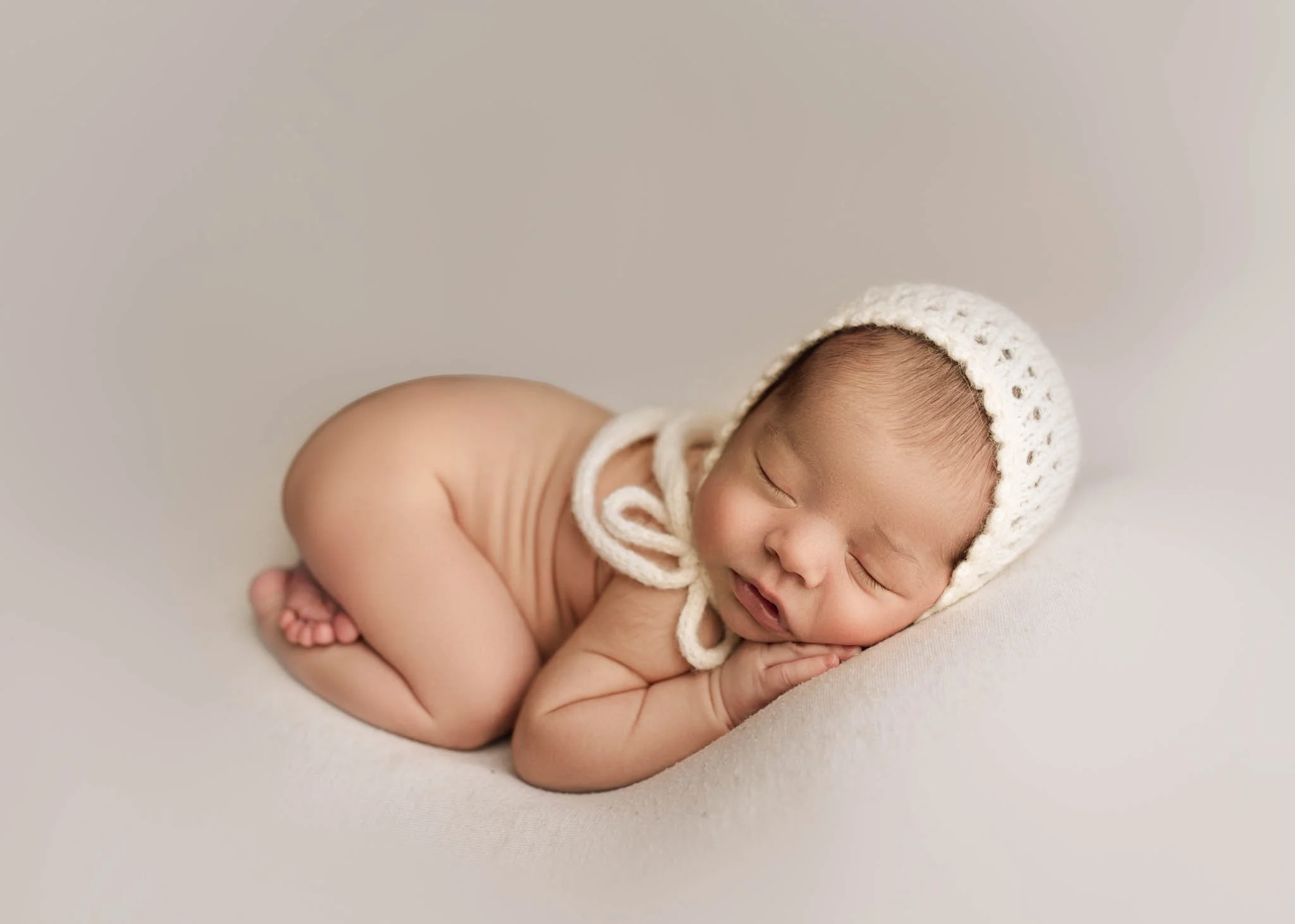 newborn baby sleeps in bum up pose, Westchester County, ny