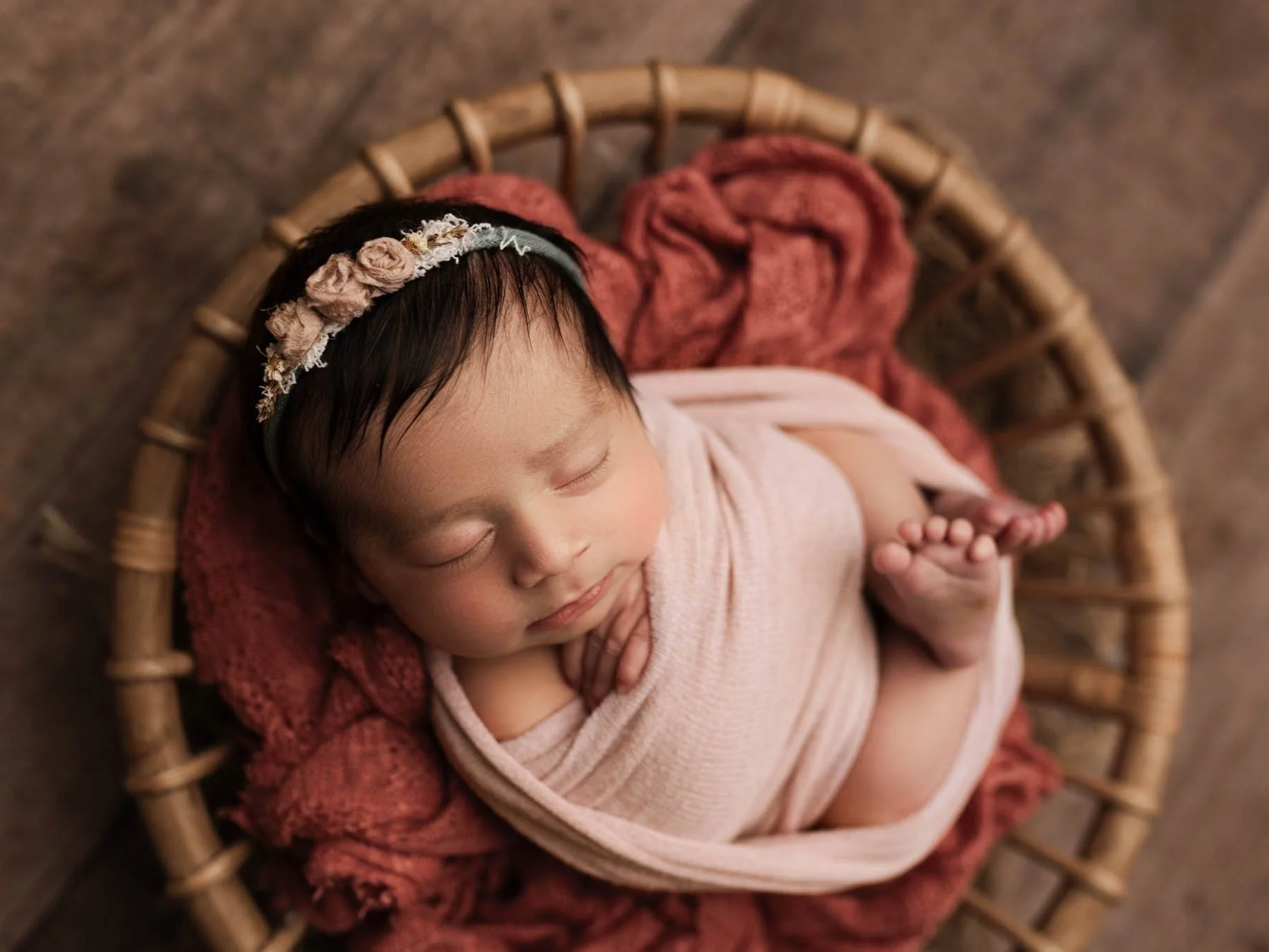 baby girl sleeps in basket with pink blanket, ridgefield, ct studio