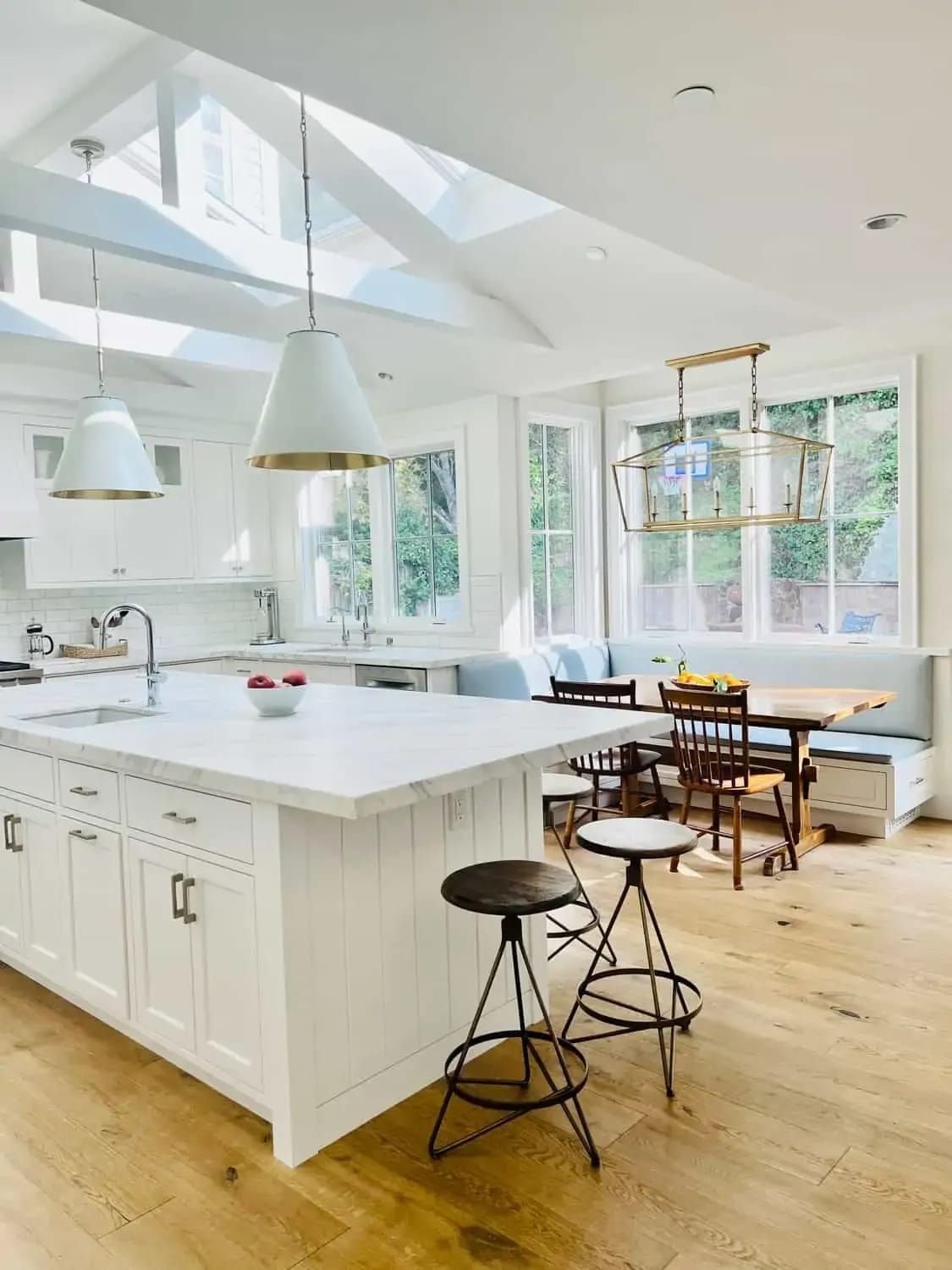 A Sunny White Kitchen And Great Room - Classic Casual Home.jpeg