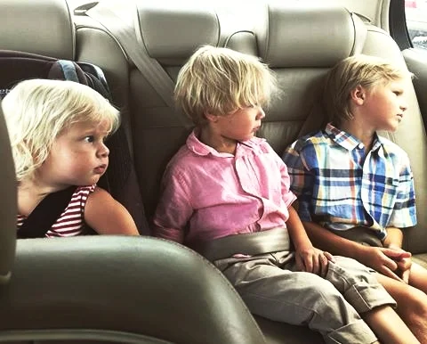 3 brothers in the car.jpg