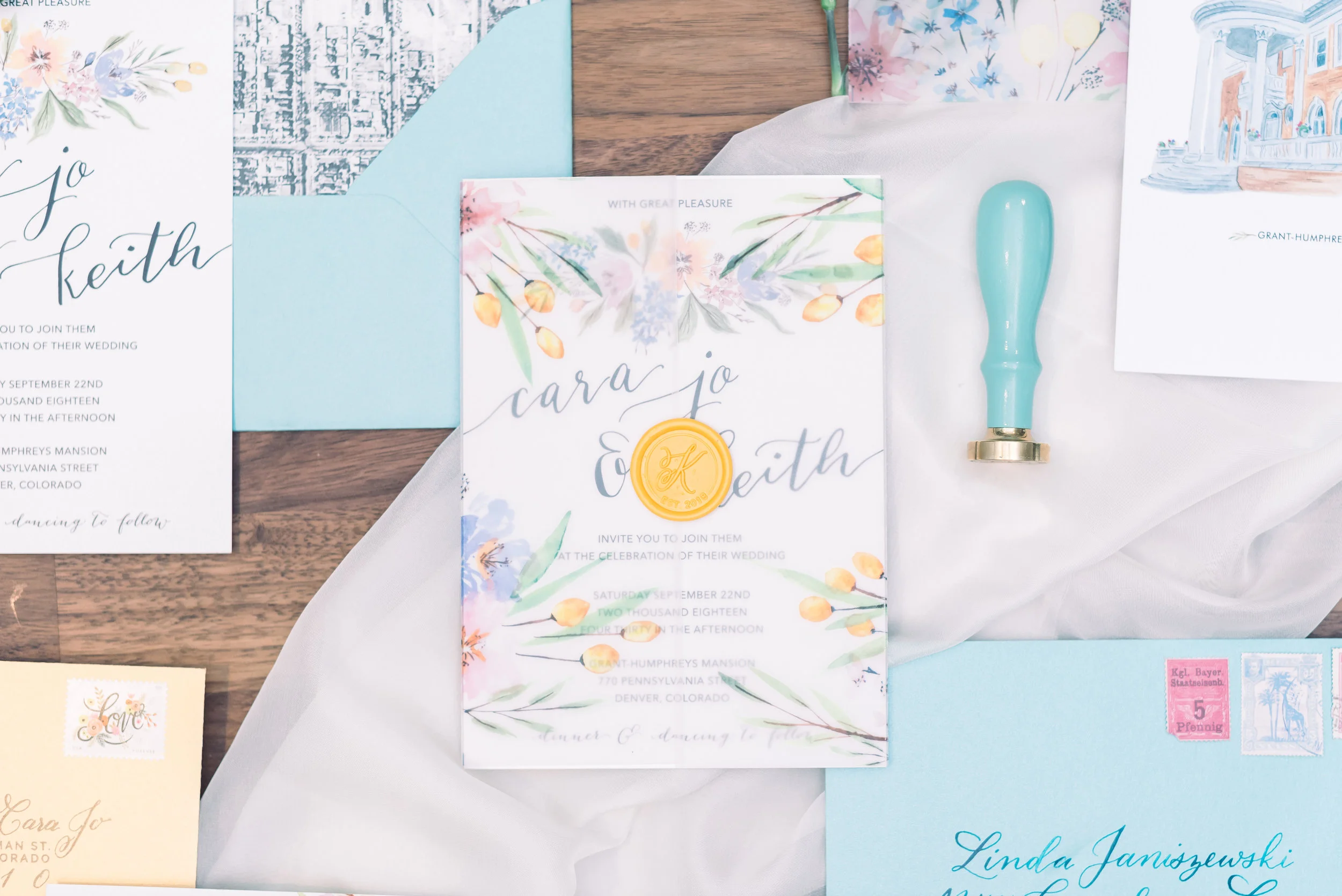 Watercolor Floral invitation suite with vellum wrap
