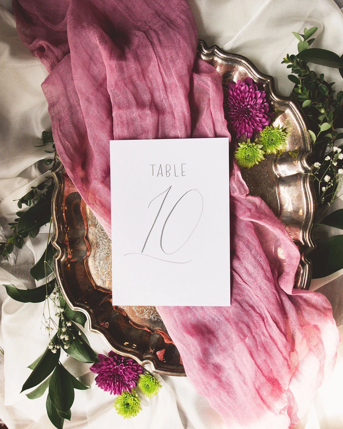 Simple and elegant white table numbers with gray ink