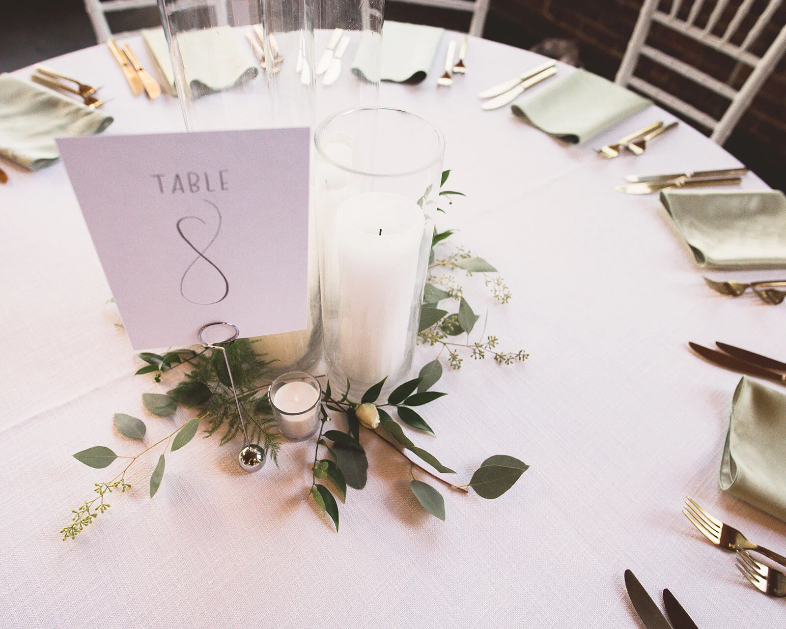 Simple and elegant white table numbers with gray ink.