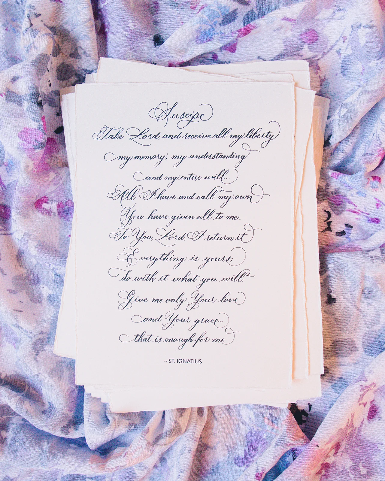 Hand written scripture, individually wrapped in a clear sleeve to protect it.